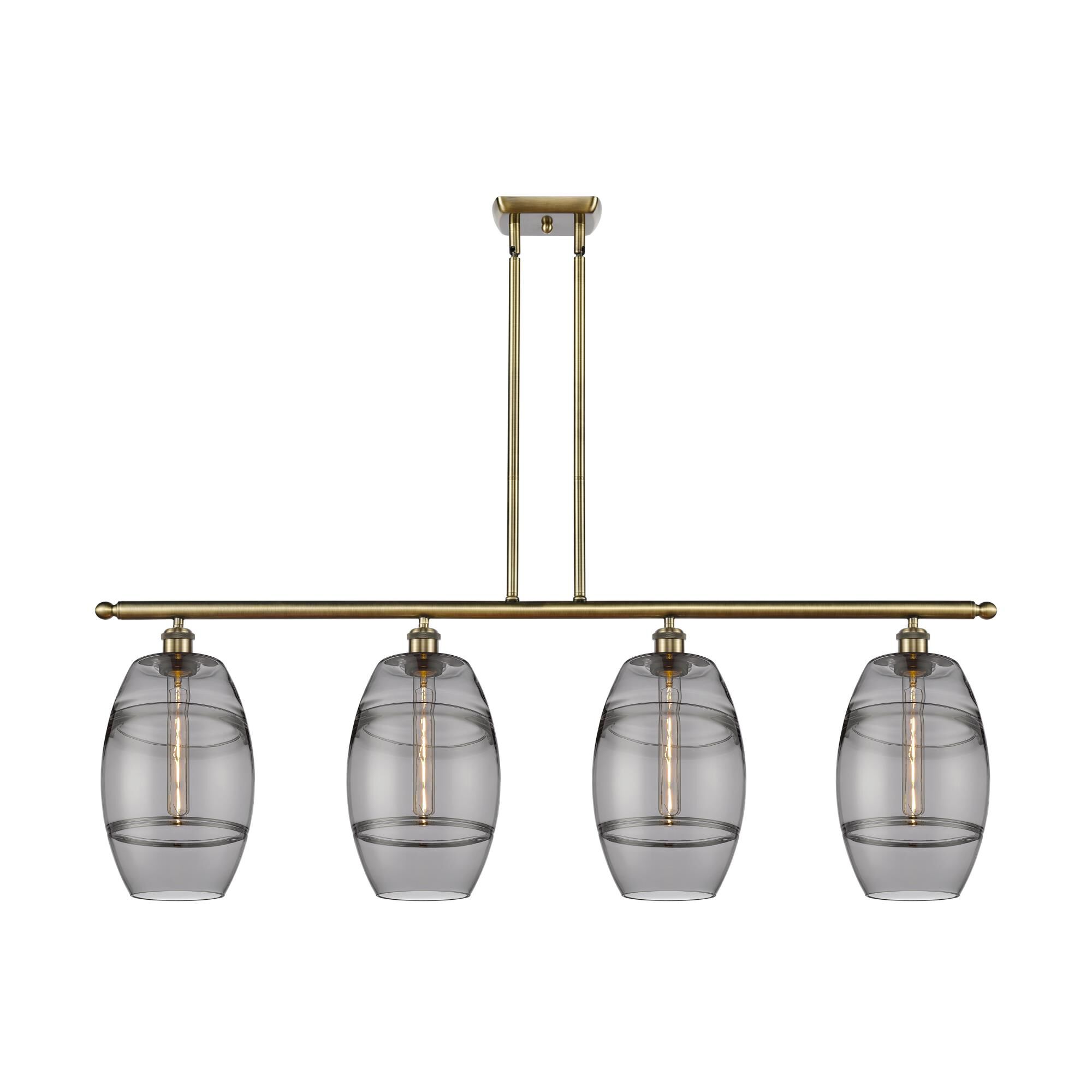 Shown in Antique Brass finish and Light Smoke glass