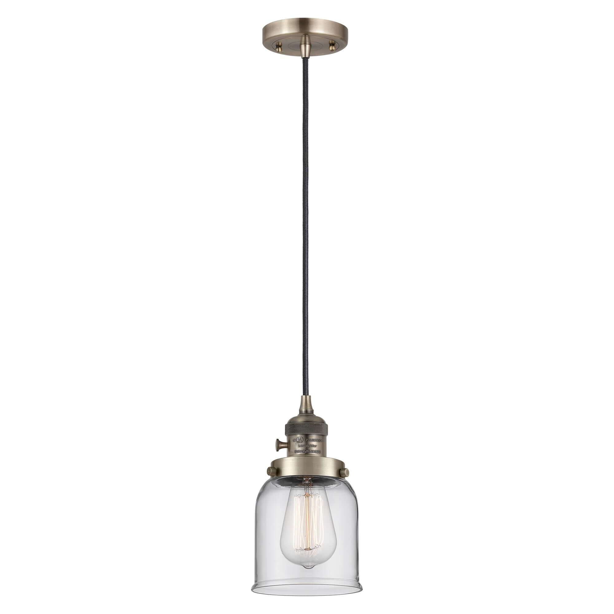 Shown in Antique Brass finish and Clear glass