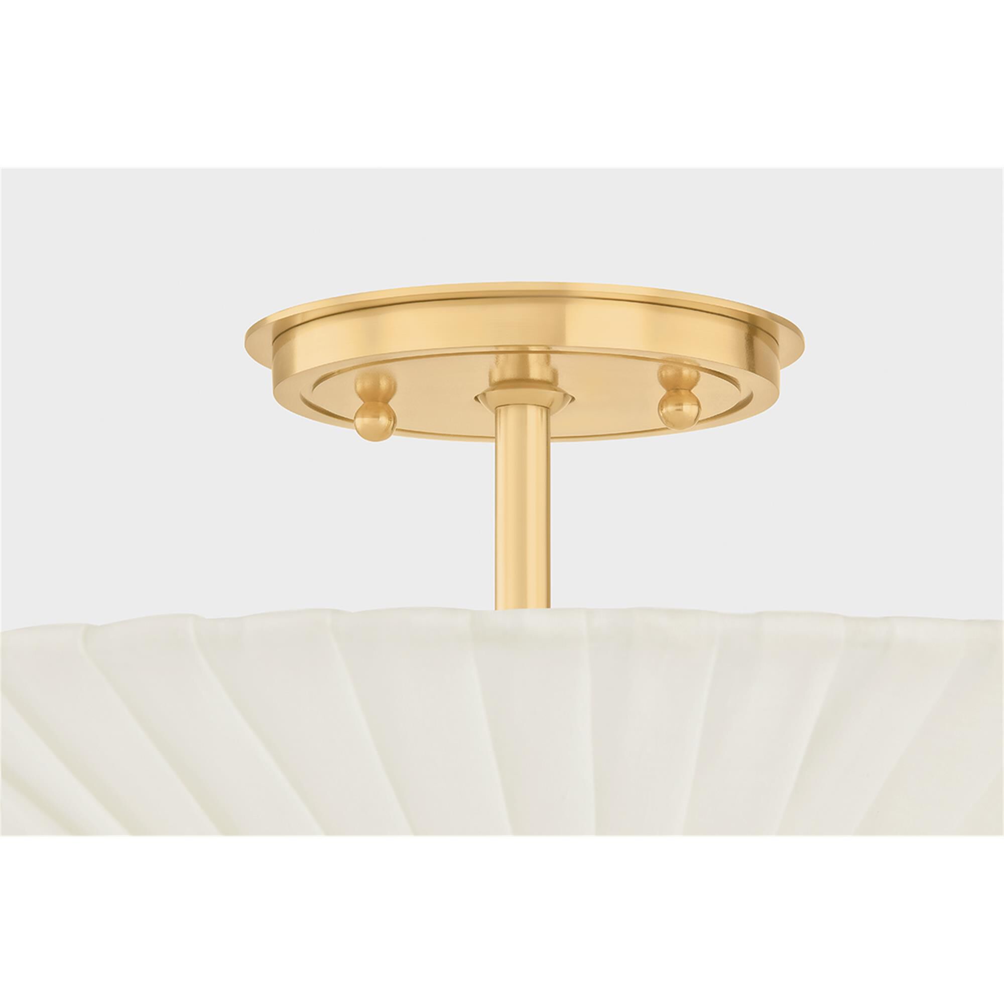 Shown in Aged Brass finish and Ivory Linen shade