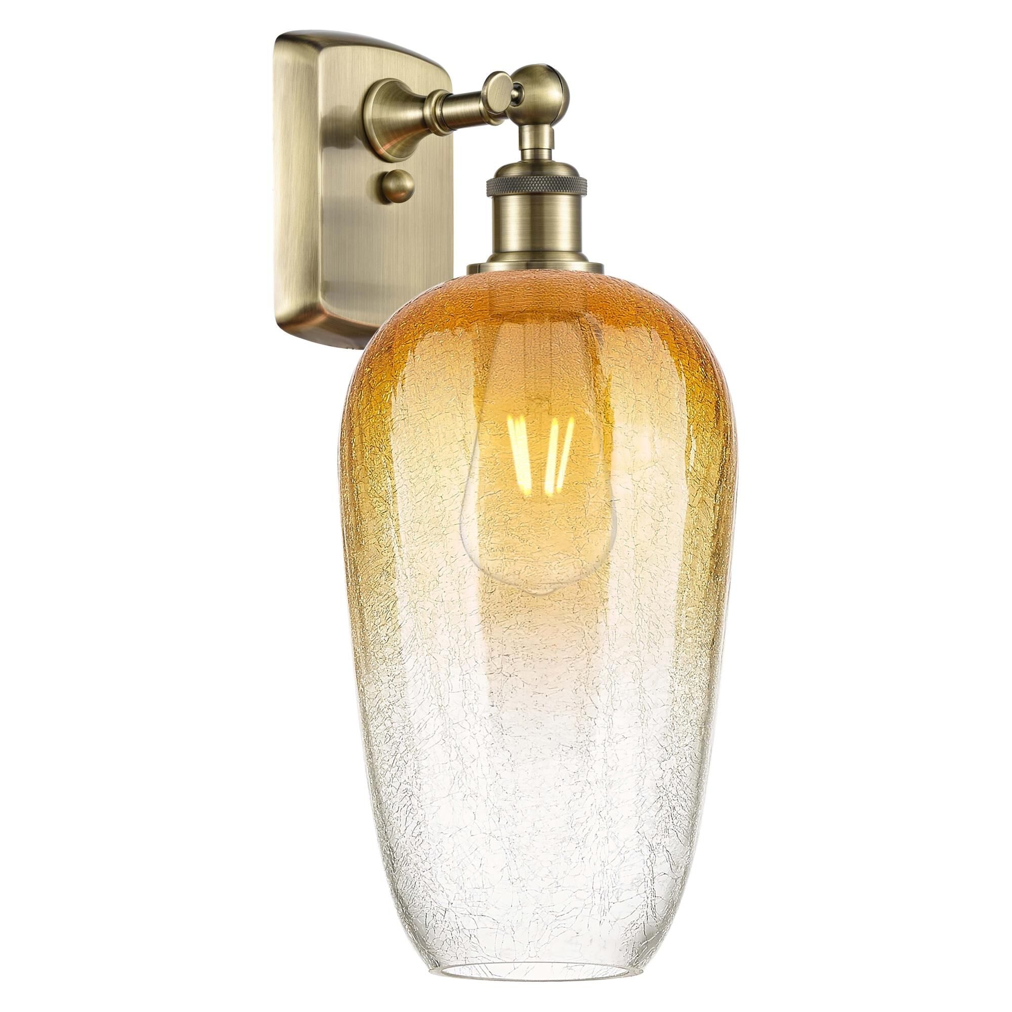 Shown in Antique Brass finish and Amber glass