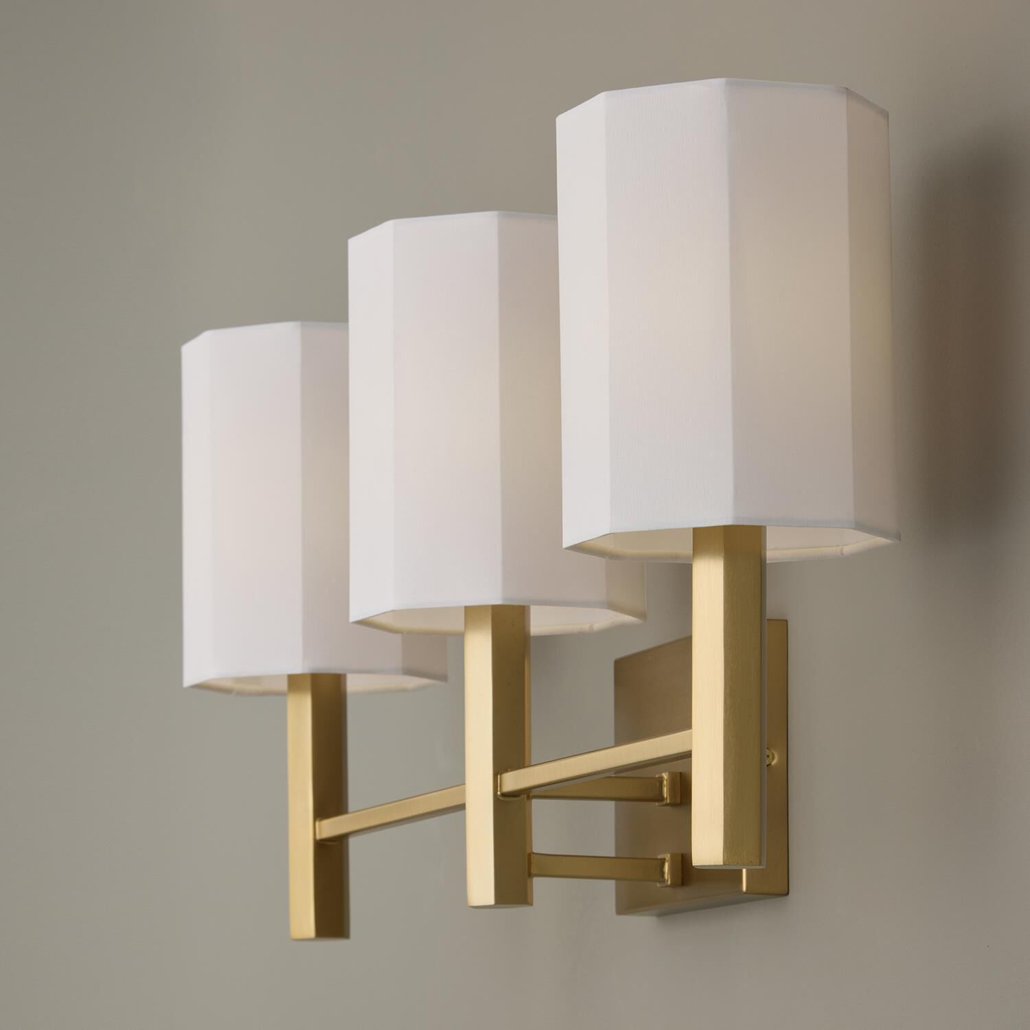Shown in Aged Brass finish and White Fabric Octagonal s shade