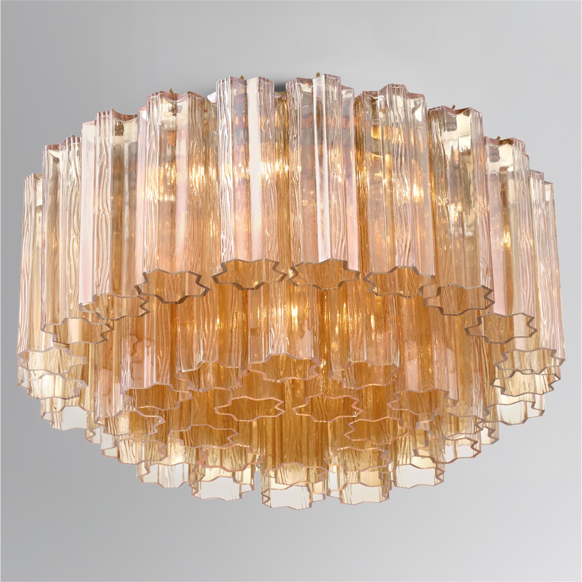 Shown in Aged Brass finish and Tronchi Amber glass