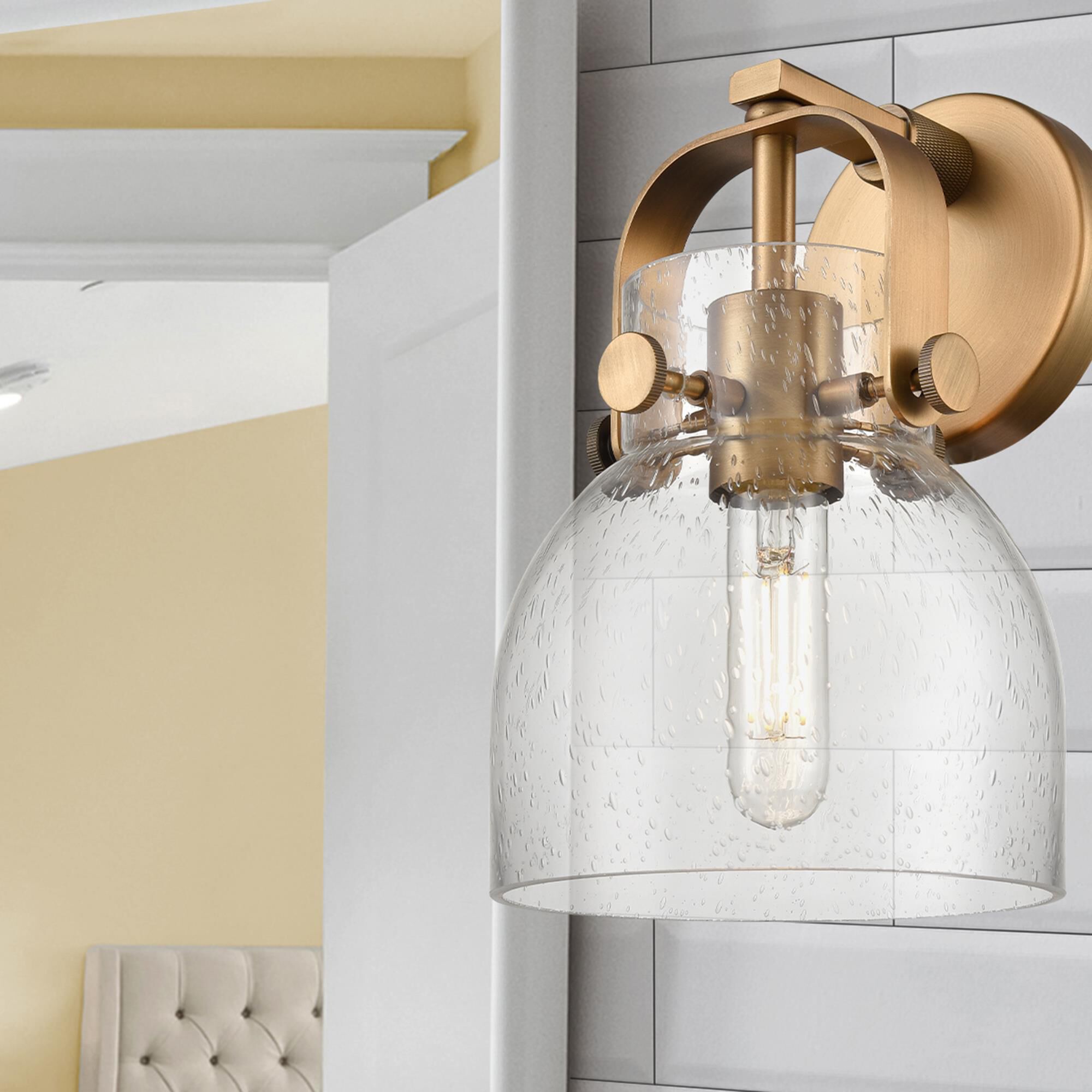 Shown in Brushed Brass finish and Seedy glass