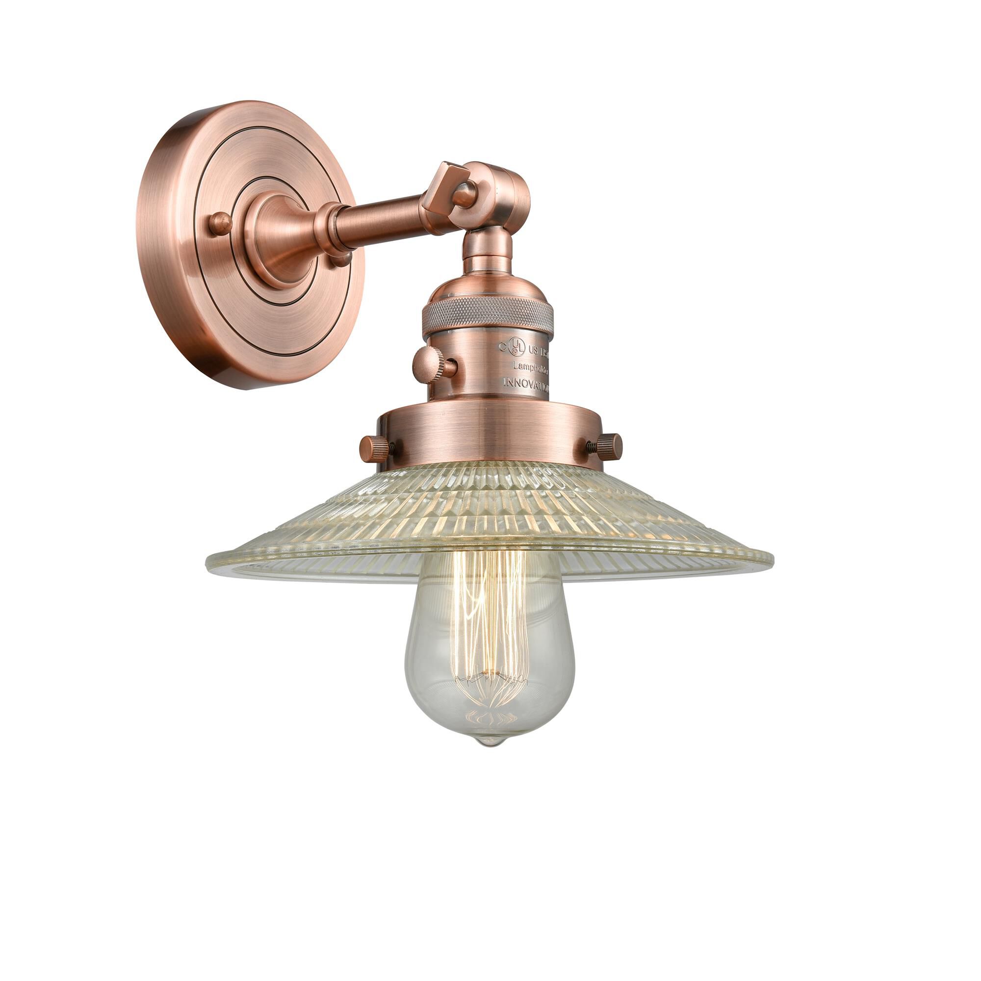 Shown in Antique Copper finish and Clear Halophane glass