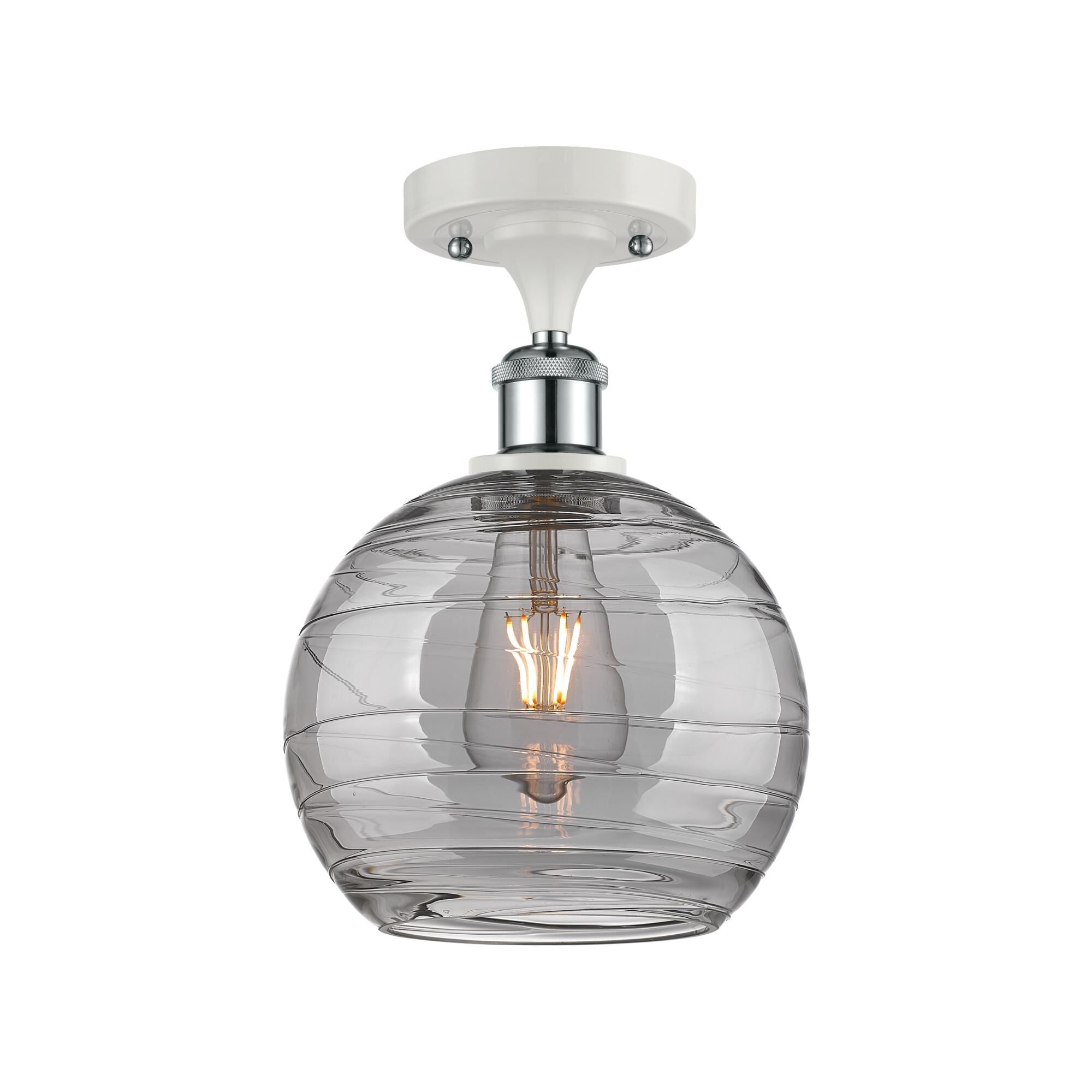 Shown in White Polished Chrome finish and Light Smoke Deco Swirl glass