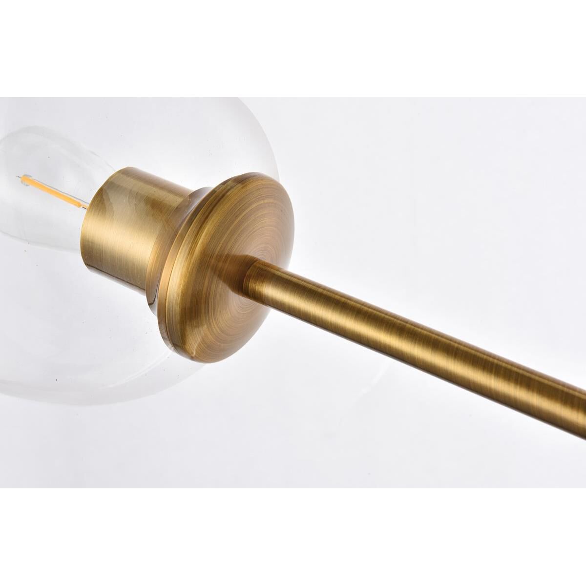 Shown in Brass finish and Clear glass