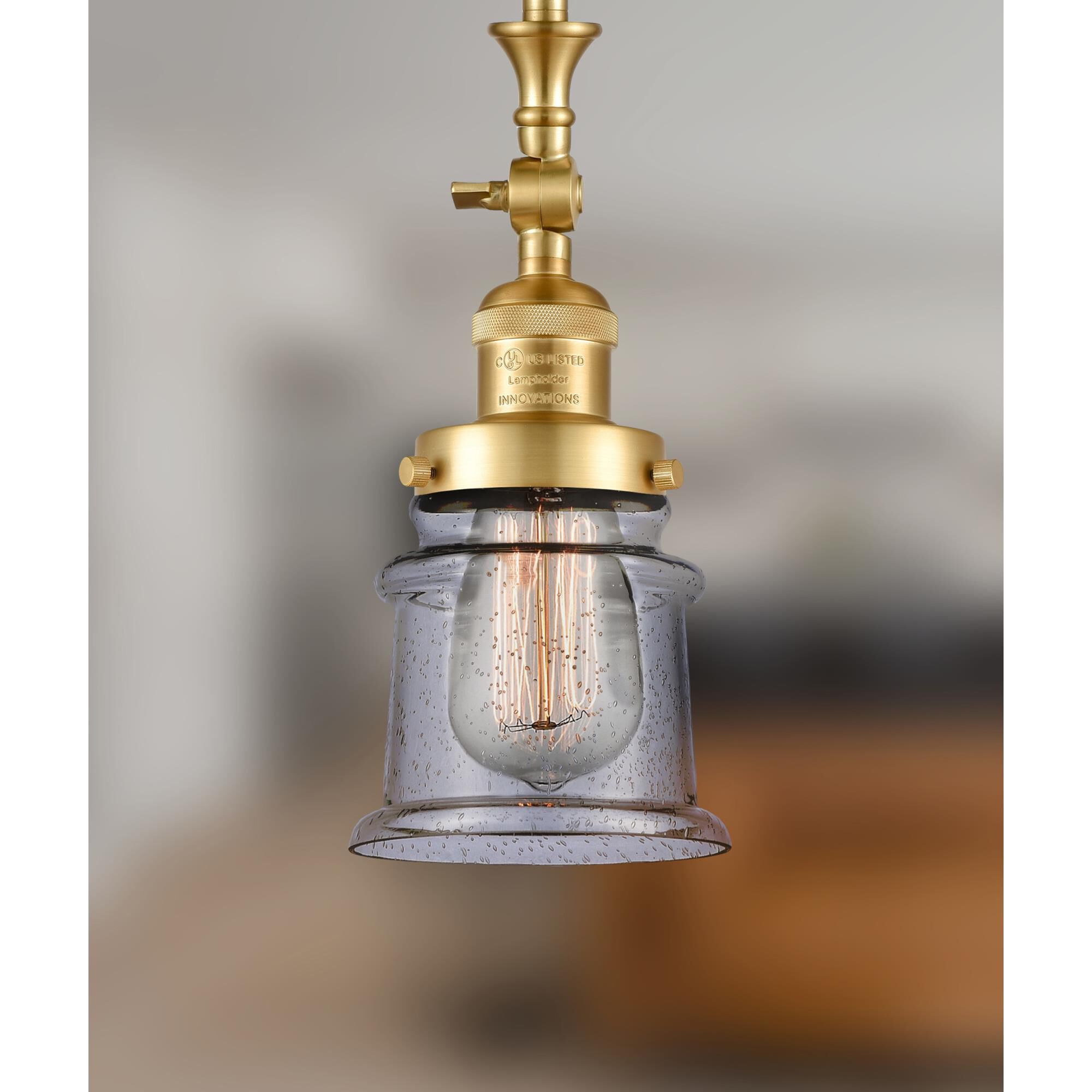 Shown in Satin Gold finish and Seedy Canton glass