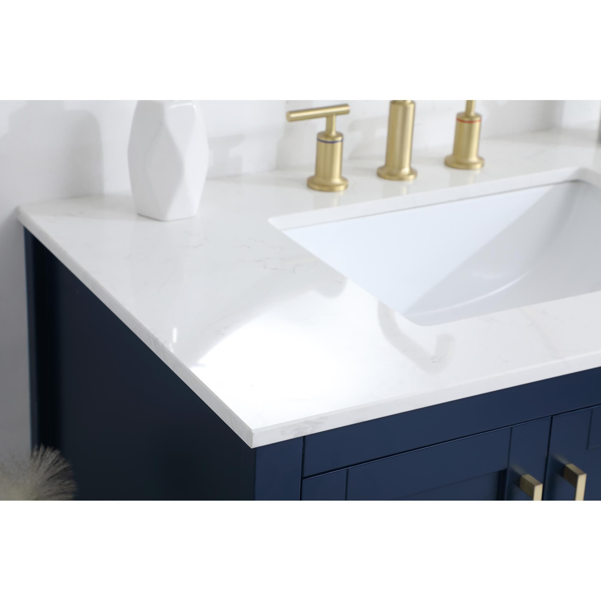 Shown in Blue And Gold With Calacatta Quartz finish