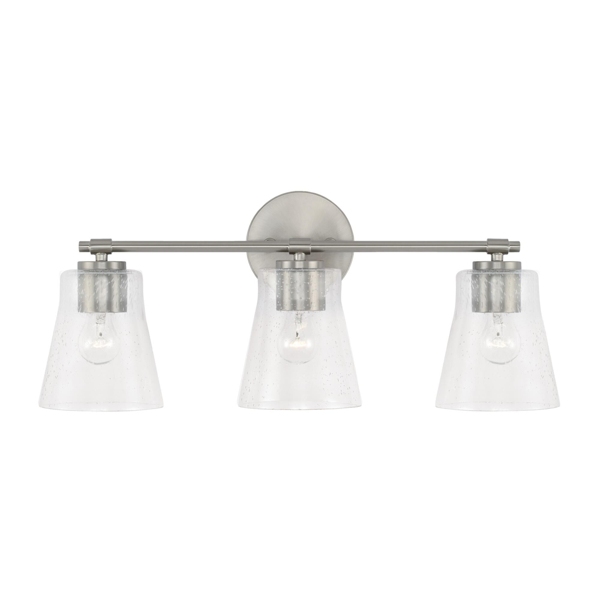Shown in Brushed Nickel finish and Clear Seeded glass