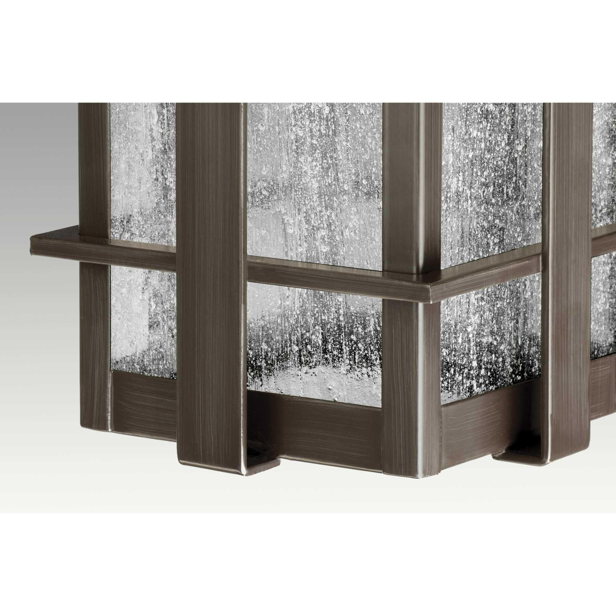 Shown in Antique Bronze finish and Clear Seeded glass