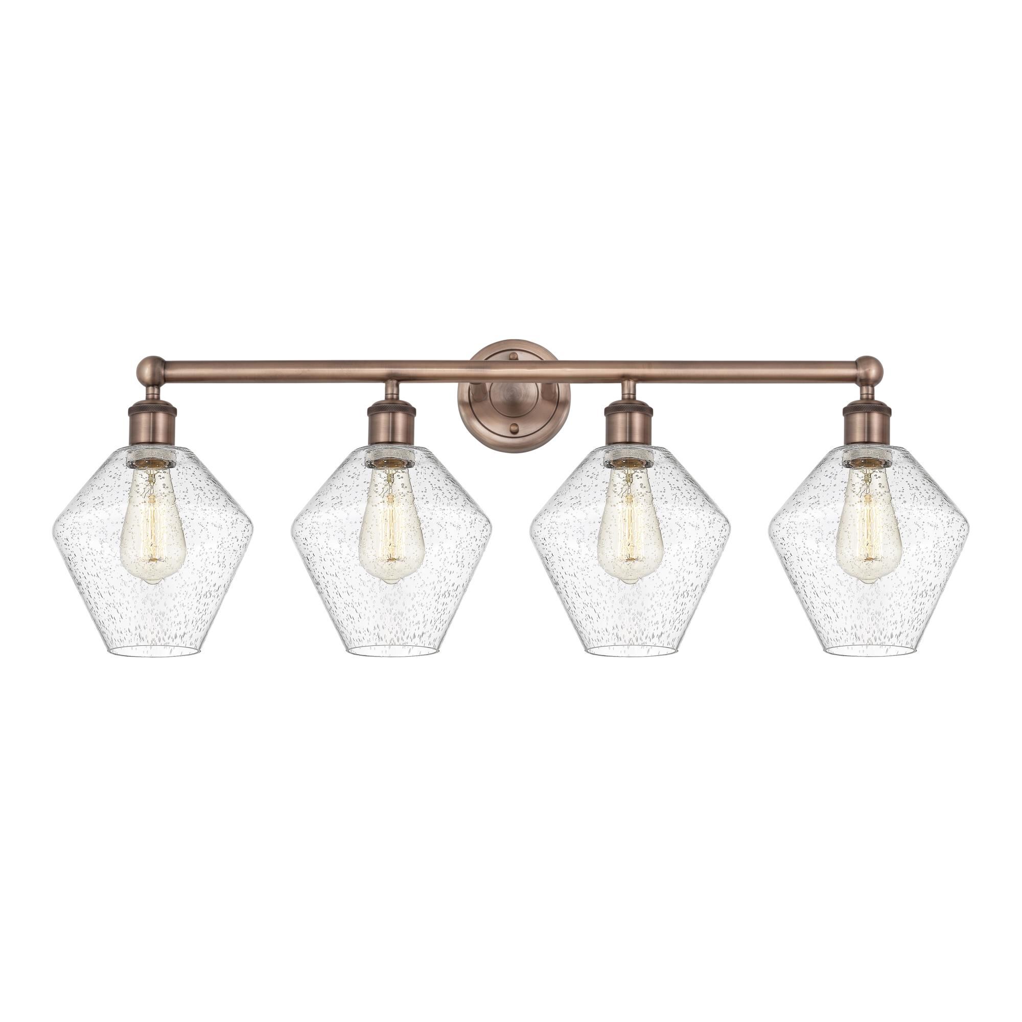 Shown in Antique Copper finish and Seedy glass