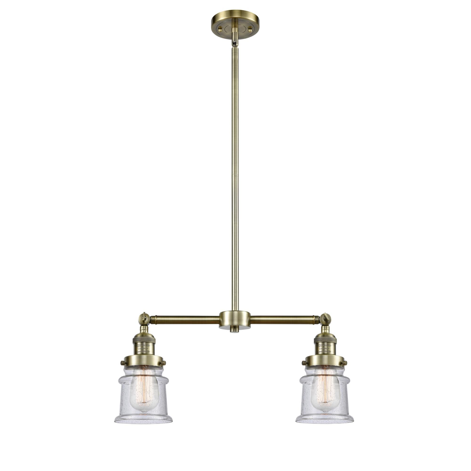 Shown in Antique Brass finish and Seedy glass