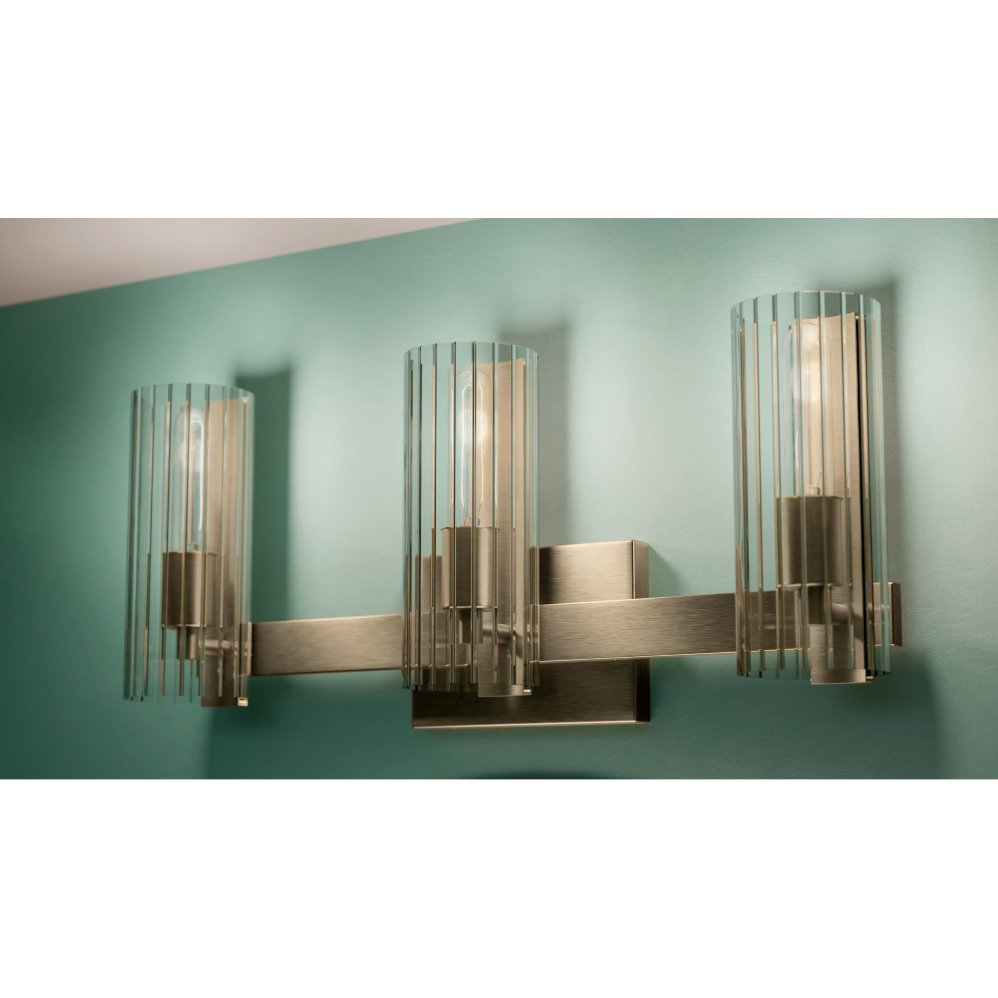 Shown in Champagne Bronze finish and Clear Fluted glass