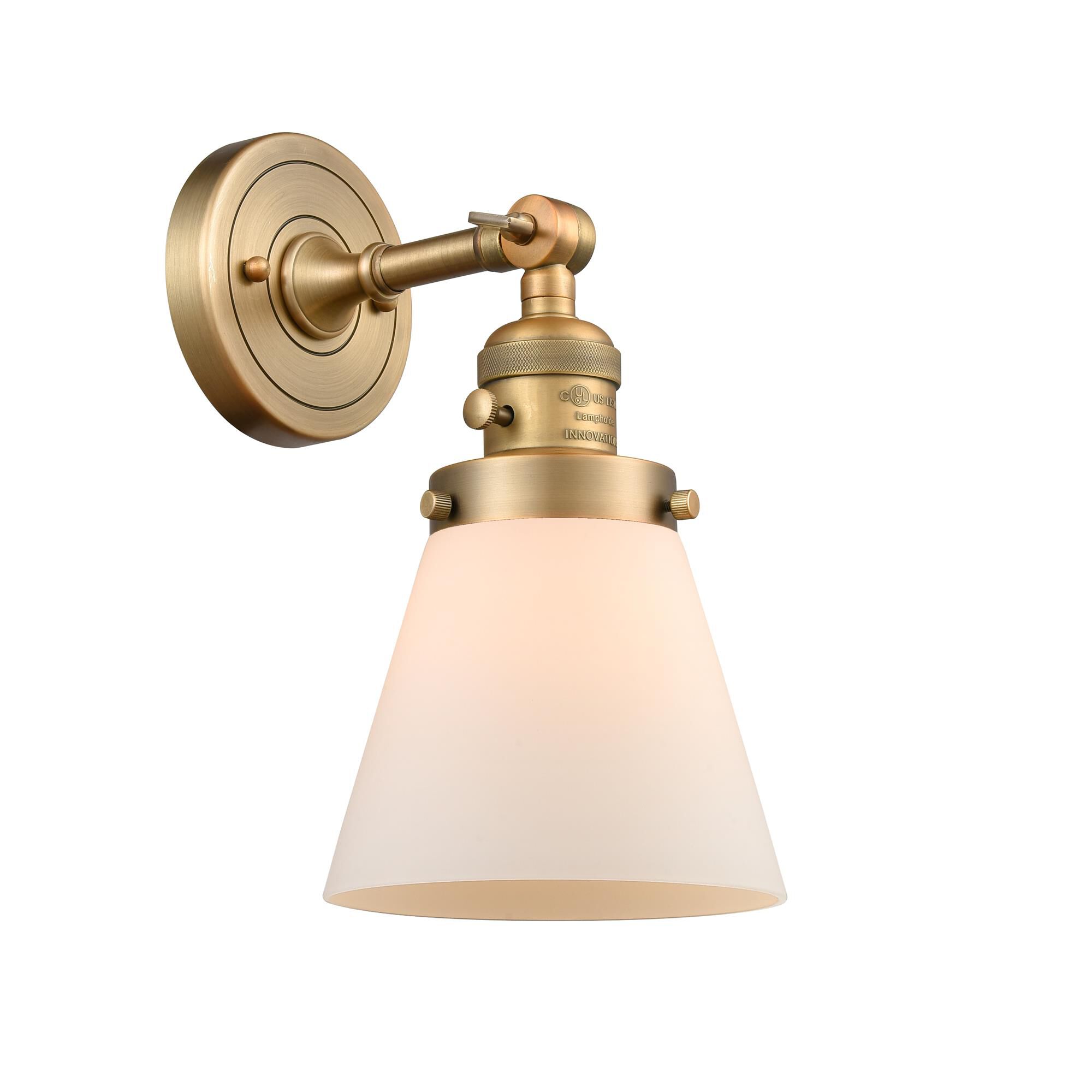 Shown in Brushed Brass finish and Matte White Cased glass