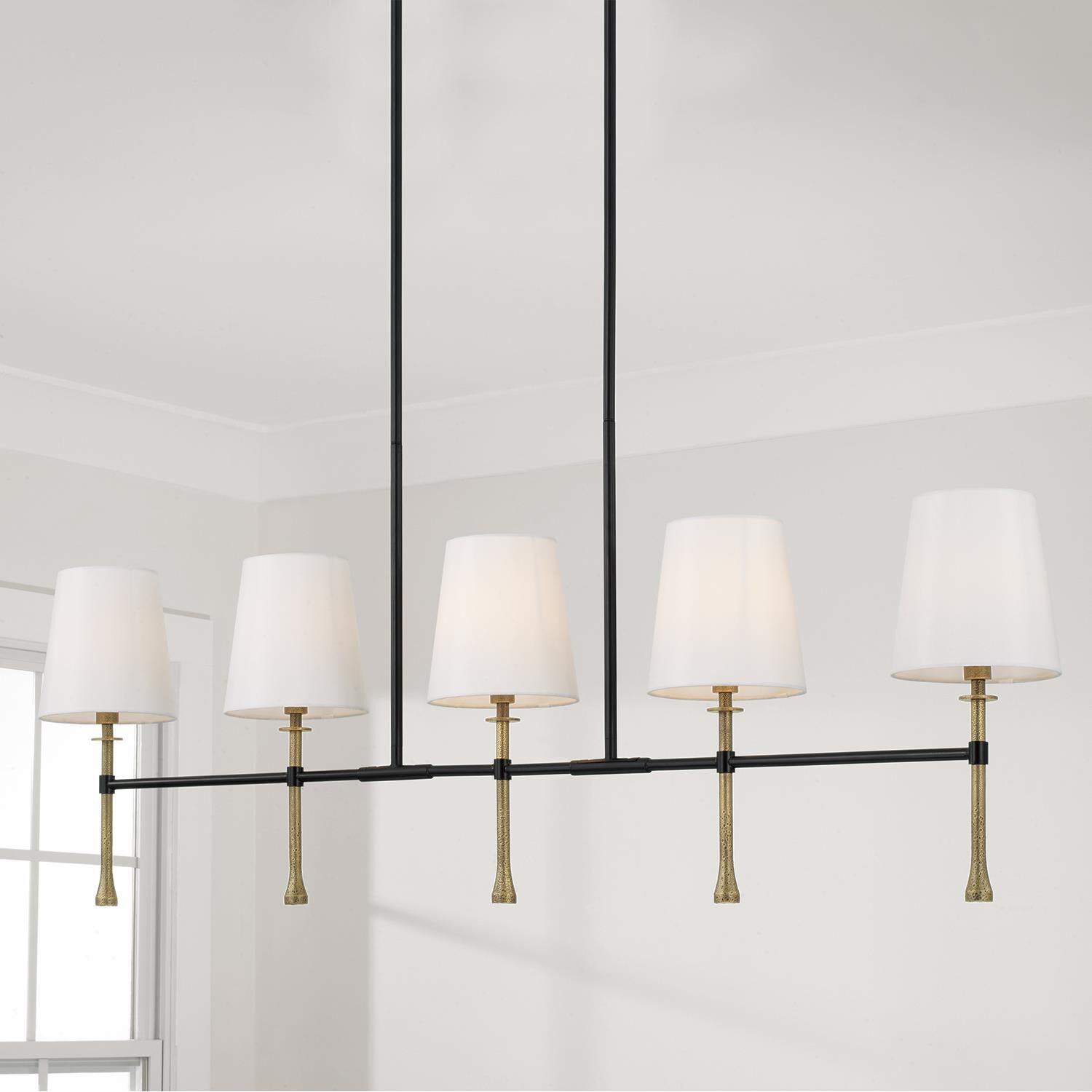 Shown in Matte Black With Hammered Gold finish and White Fabric Stay-Straight s shade