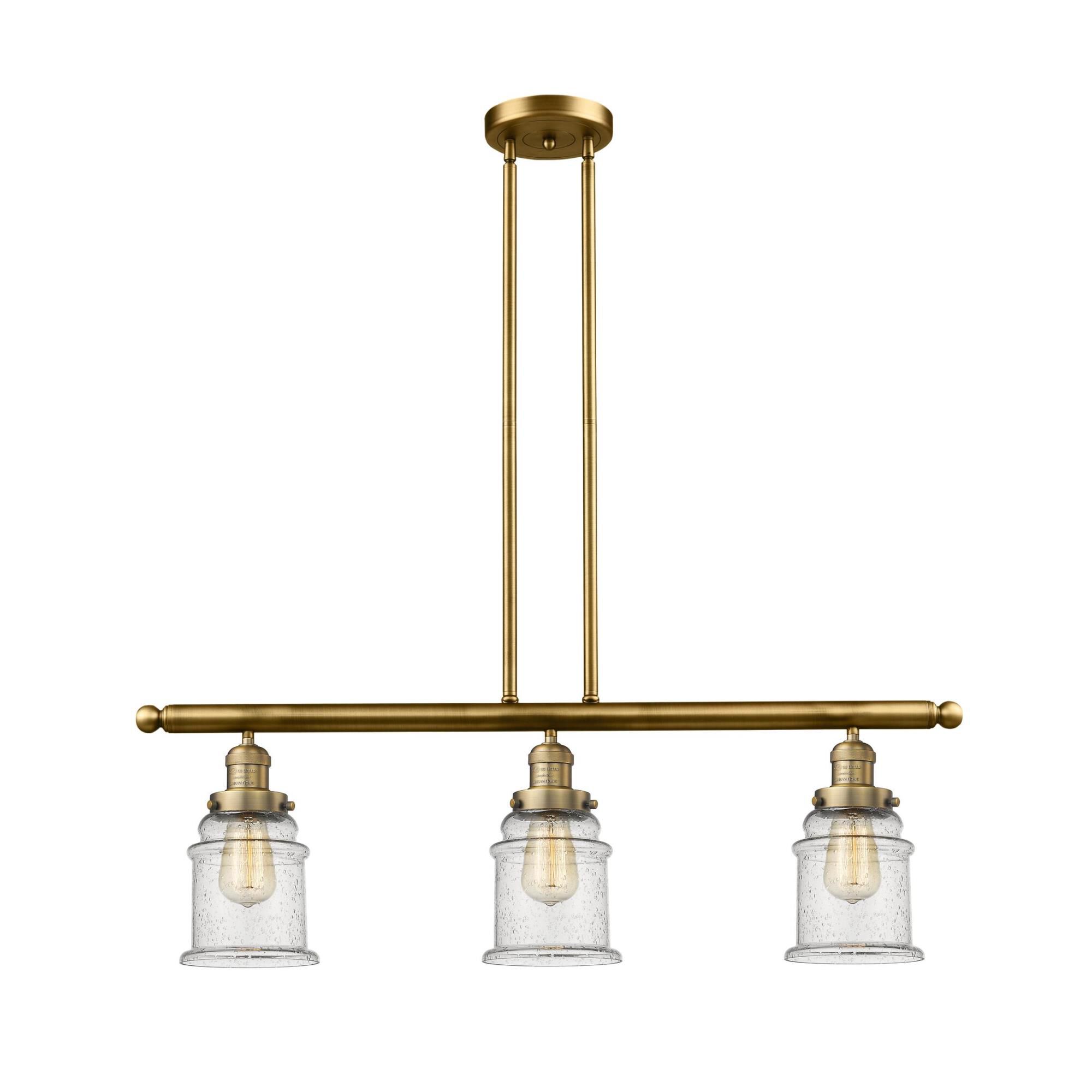 Shown in Brushed Brass finish and Seedy glass