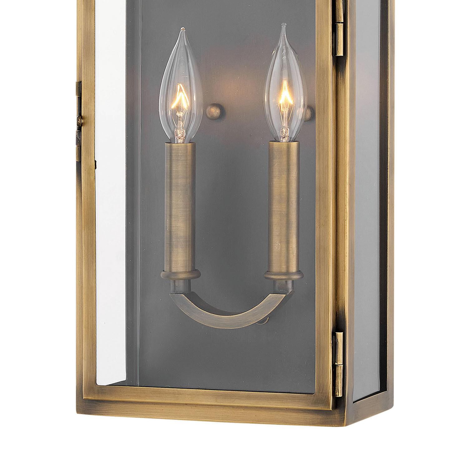 Shown in Light Antique Brass finish and Clear glass