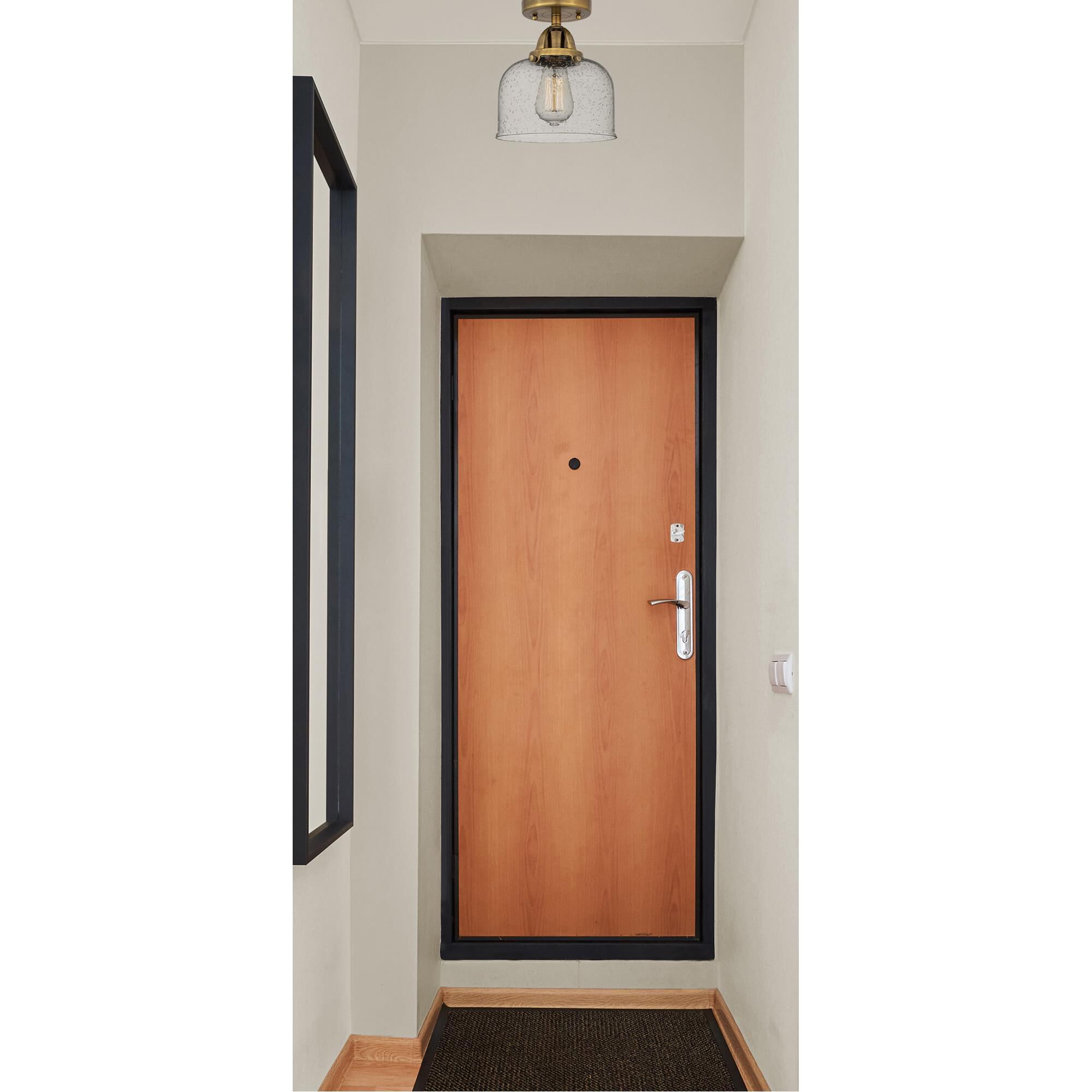 Shown in Brushed Brass finish and Seedy glass