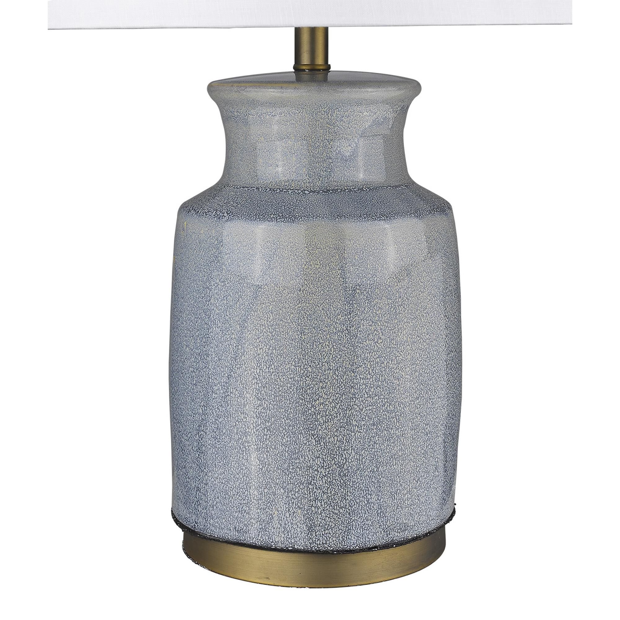 Shown in Brass finish and Seasalt glass and Seasalt Linen Tapered Drum shade