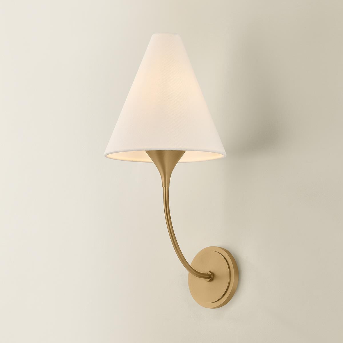 Shown in Patina Brass finish and Off White Linen shade