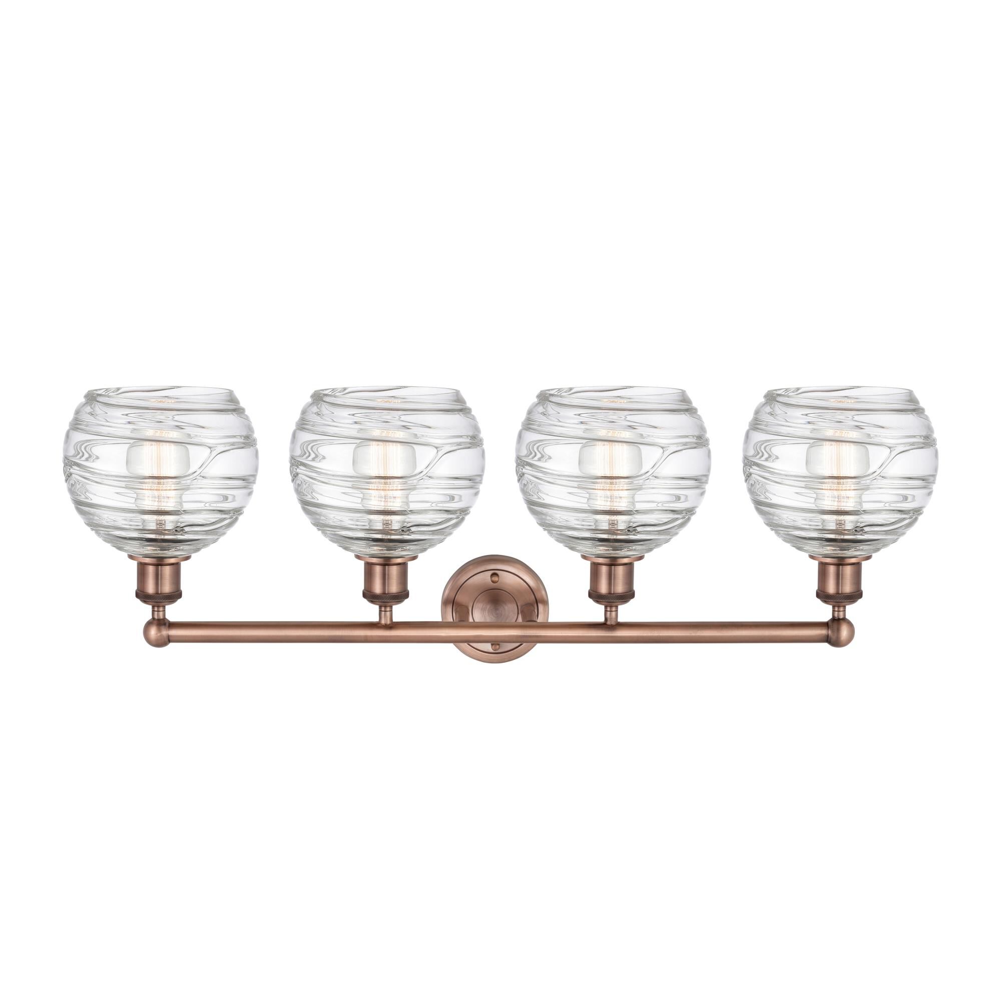 Shown in Antique Copper finish and Clear Deco Swirl glass