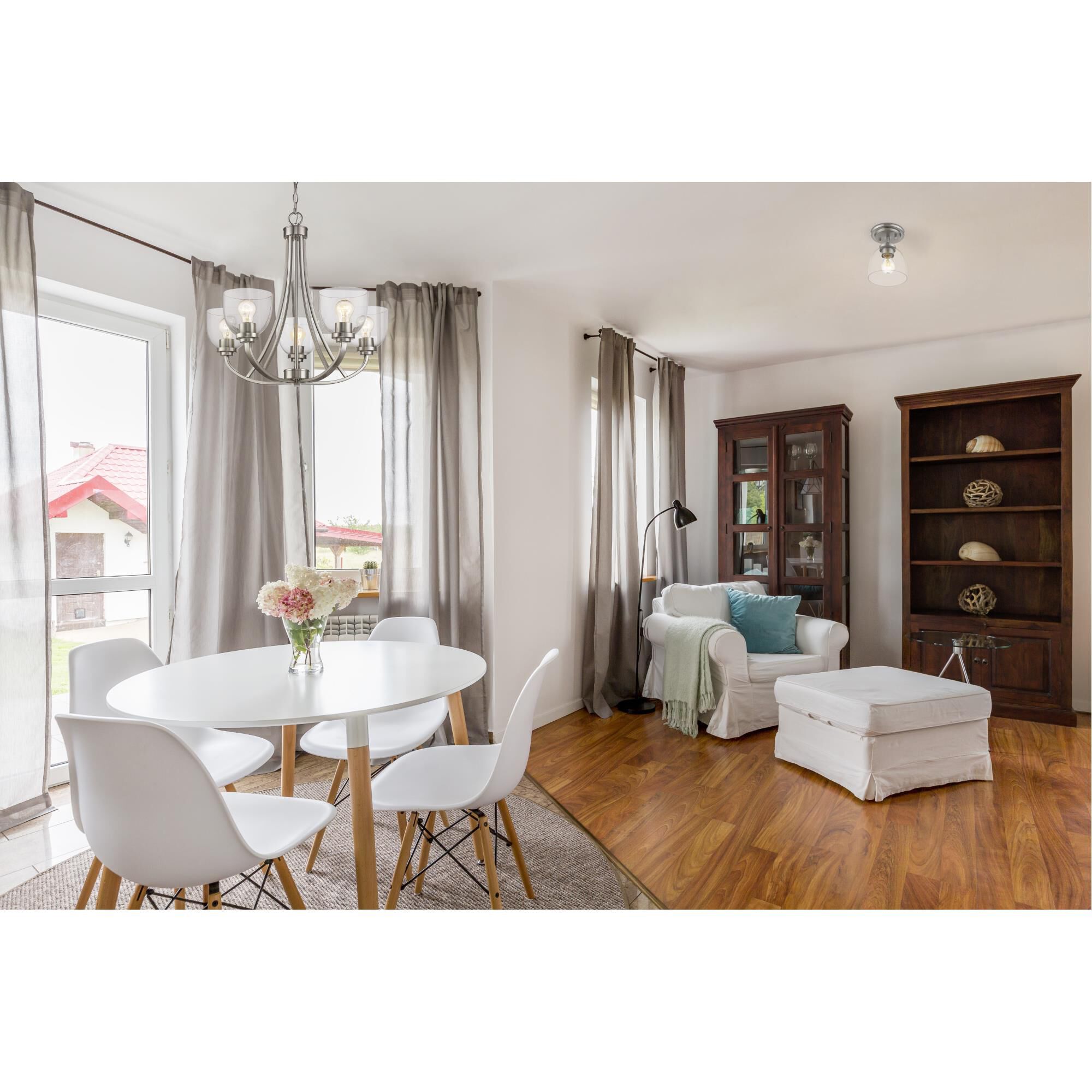 Shown in Brushed Nickel finish and Glass shade