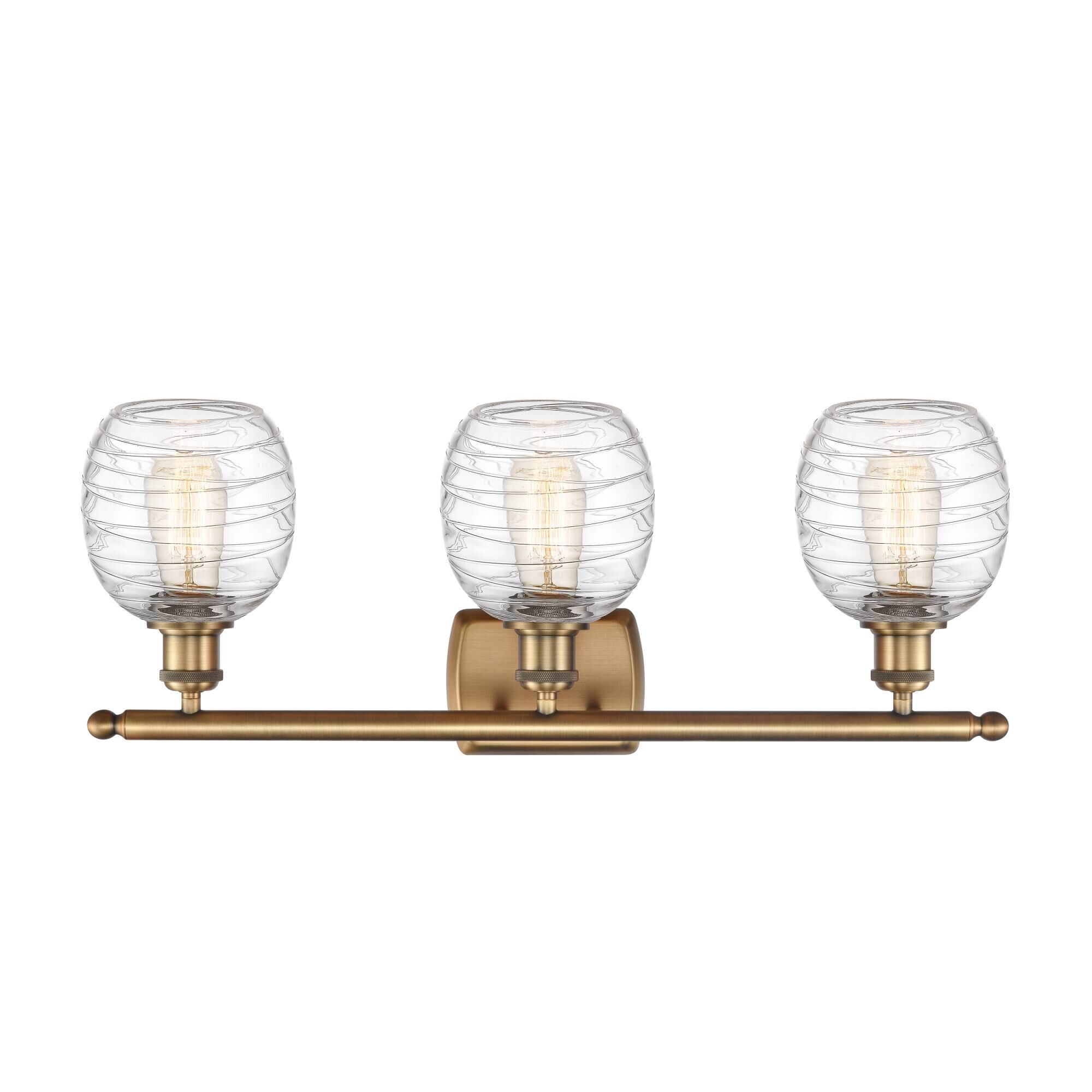 Shown in Brushed Brass finish and Deco Swirl glass