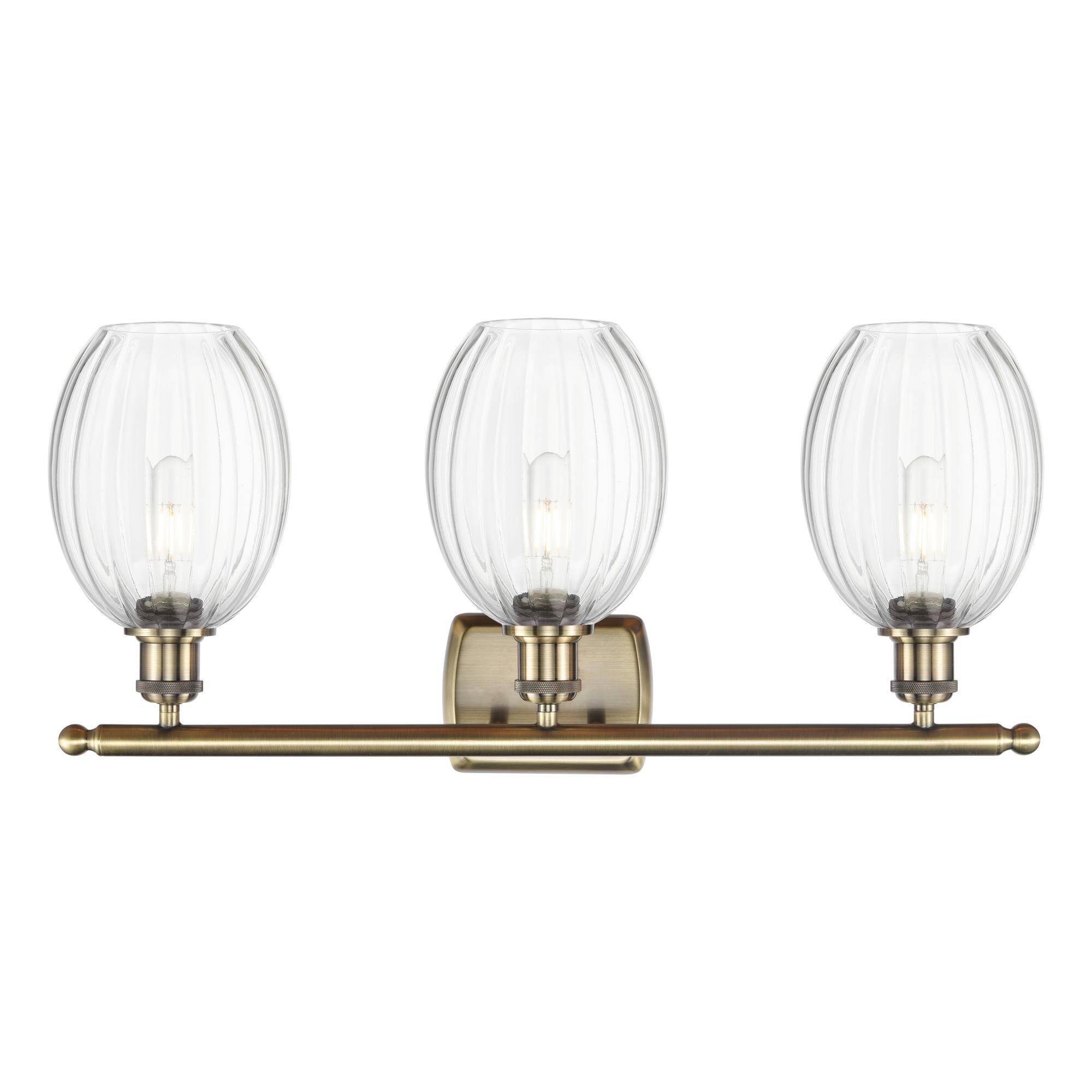 Shown in Antique Brass finish and Clear glass