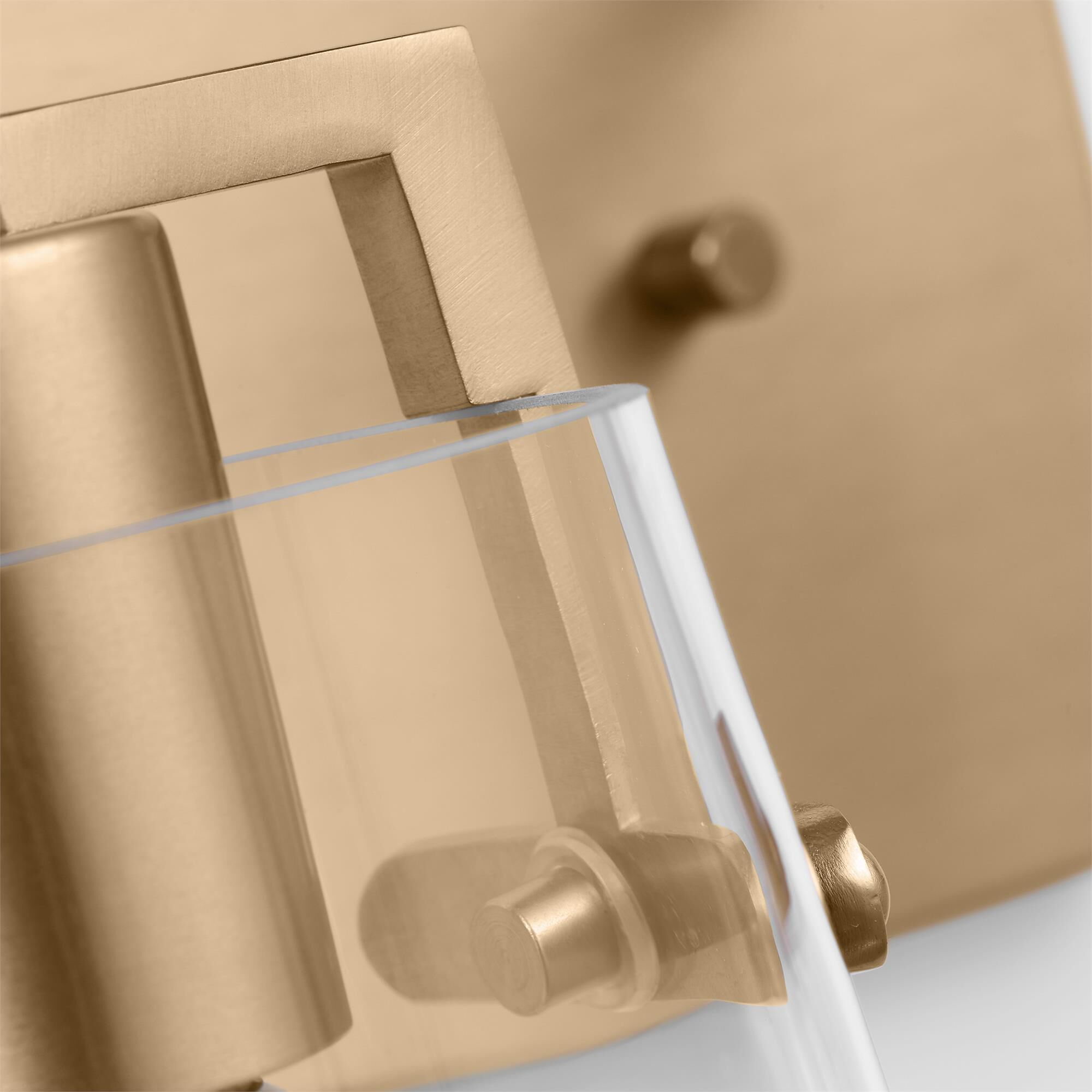 Shown in Satin Brass finish and Clear Glass s shade
