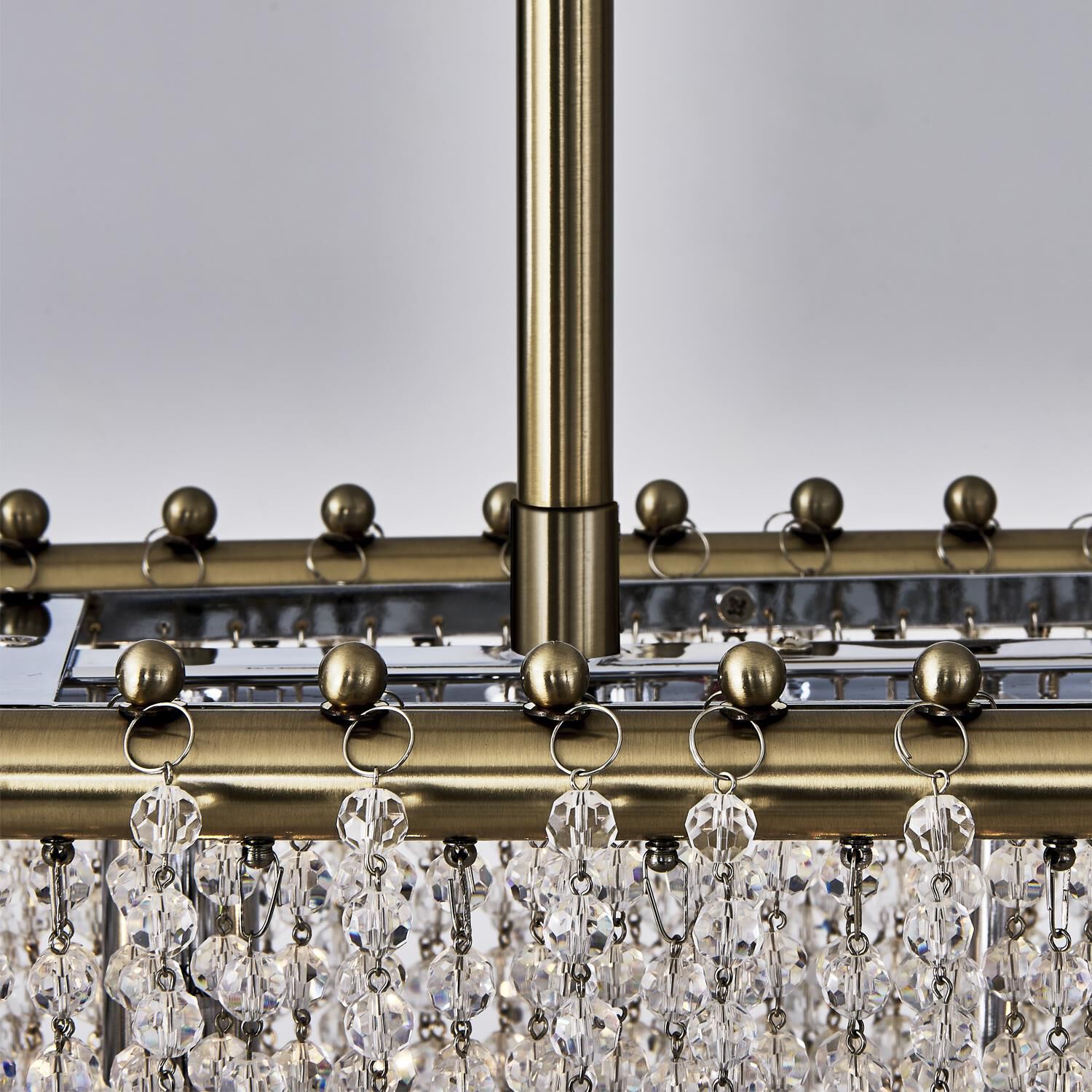 Shown in Brushed Champagne Gold finish and Clear crystal