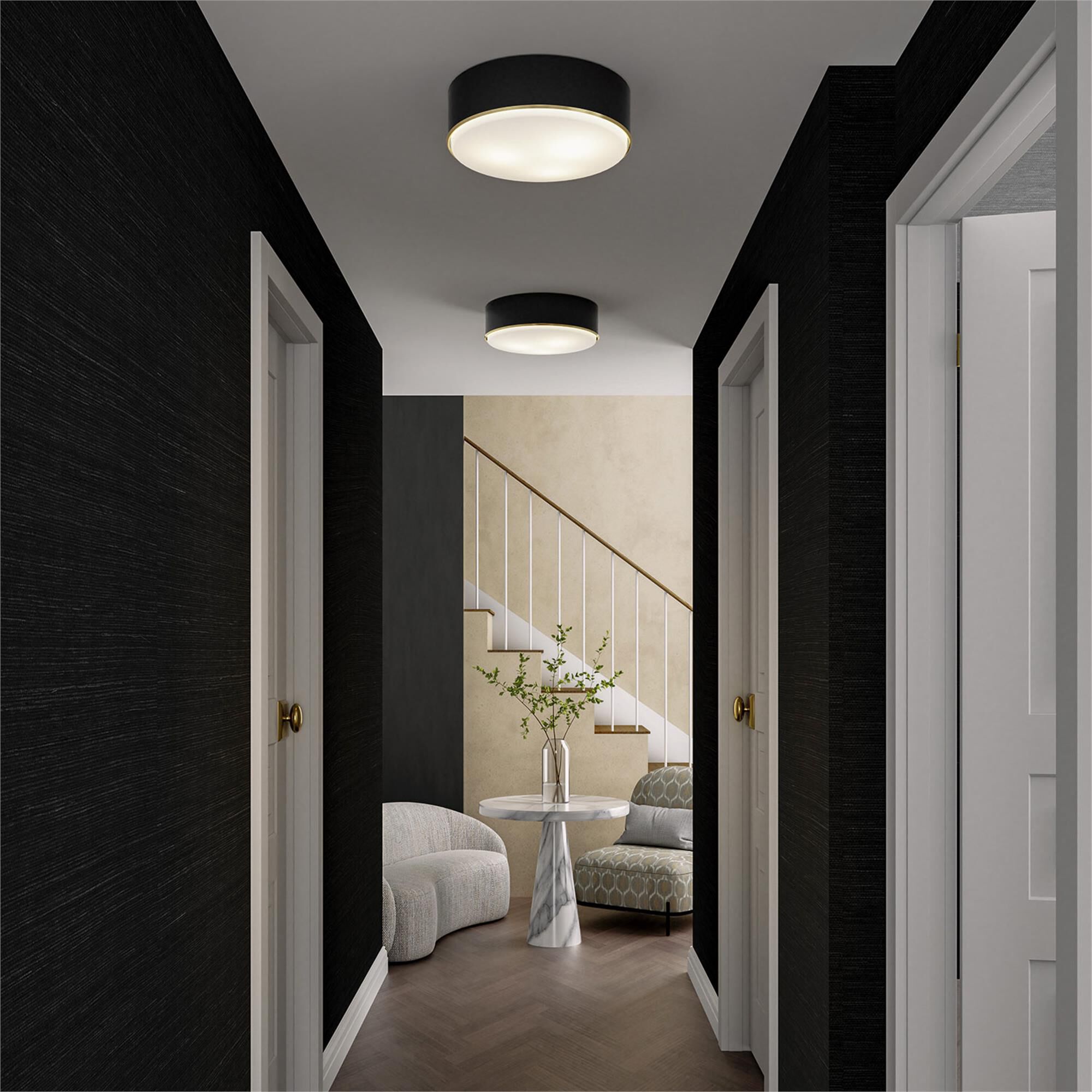 Shown in Matte Brass and Black finish and Soft White glass