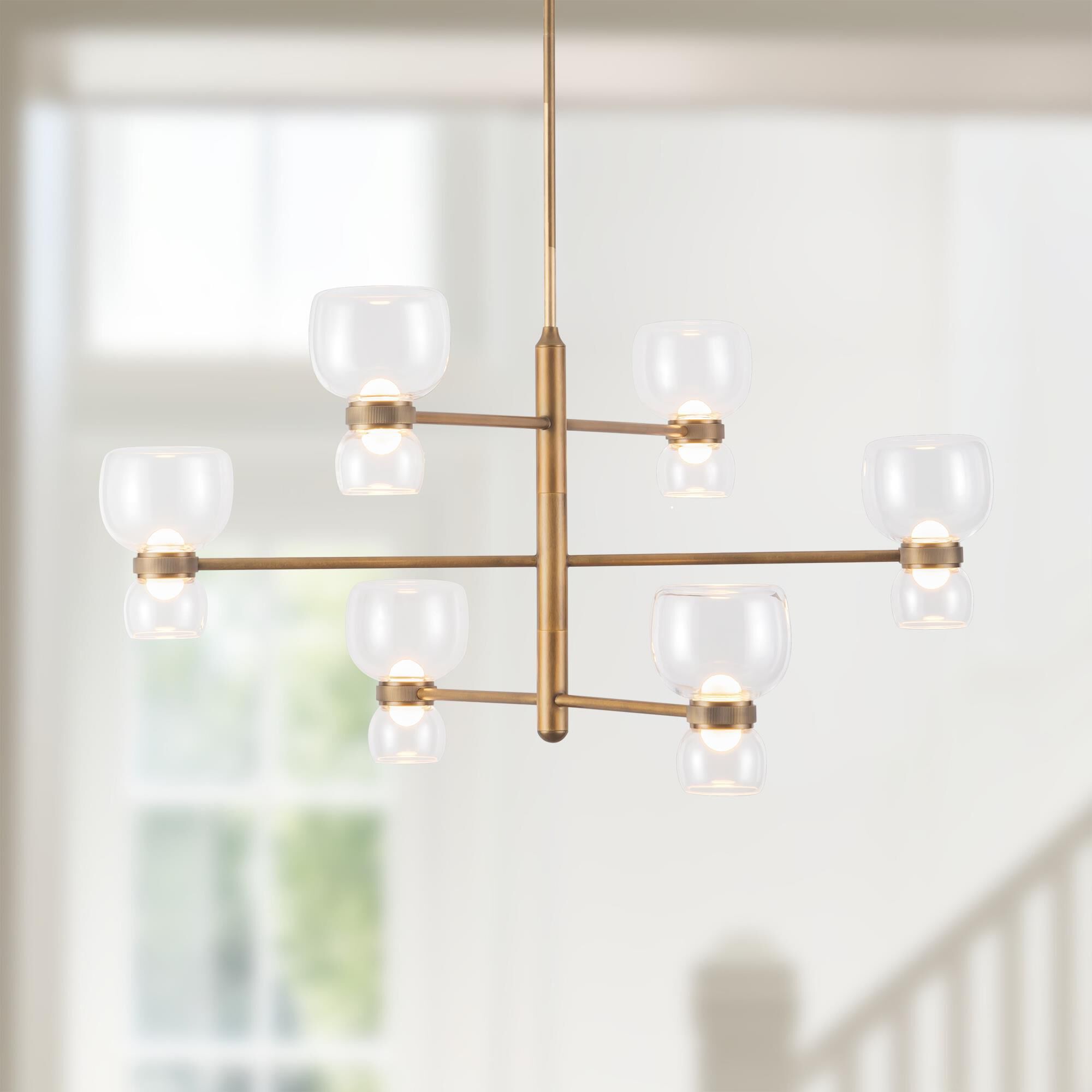 Shown in Vintage Brass finish and Clear glass