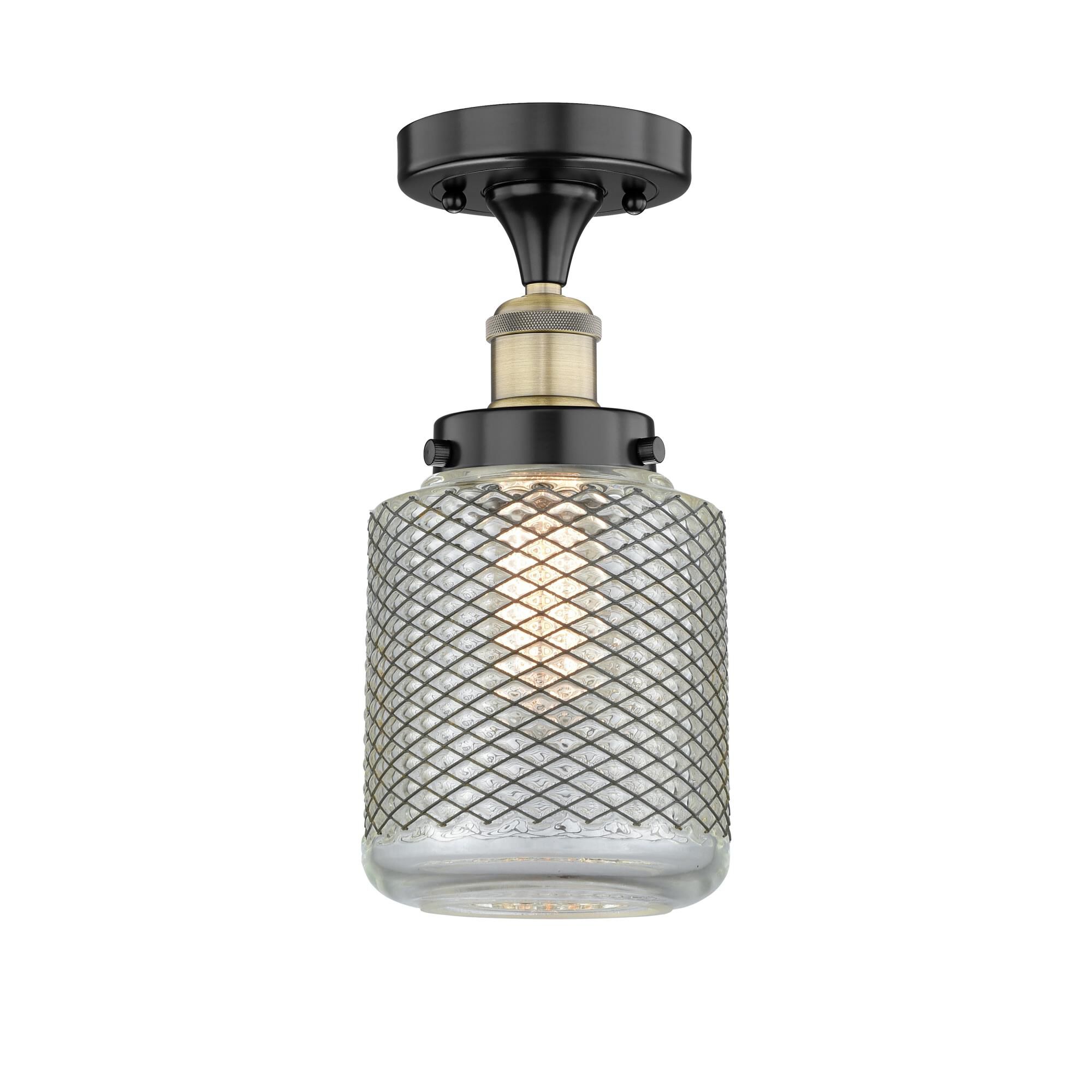 Shown in Black Antique Brass finish and Clear Wire Mesh glass