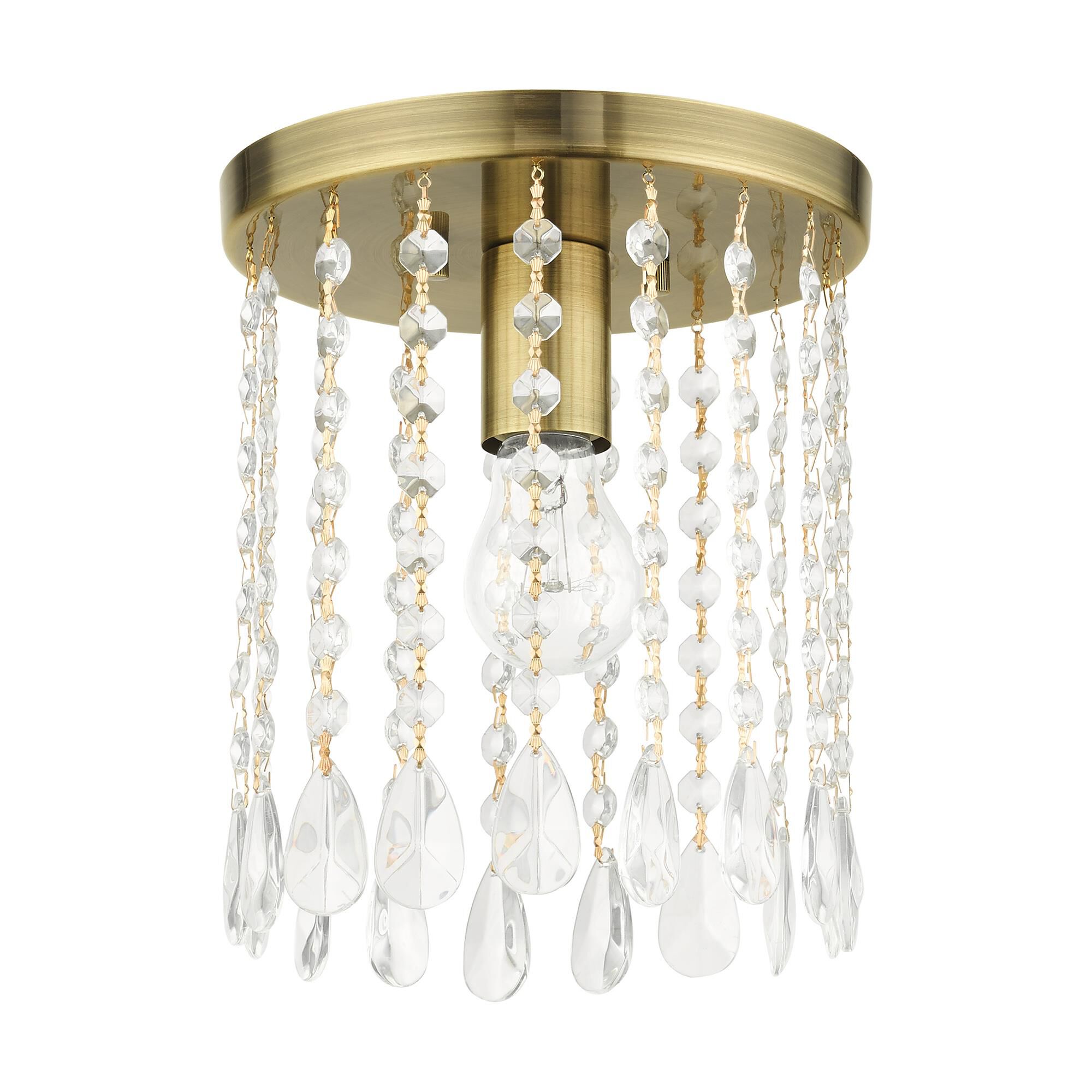 Shown in Antique Brass finish and Hand Assembled Crystal Shade glass
