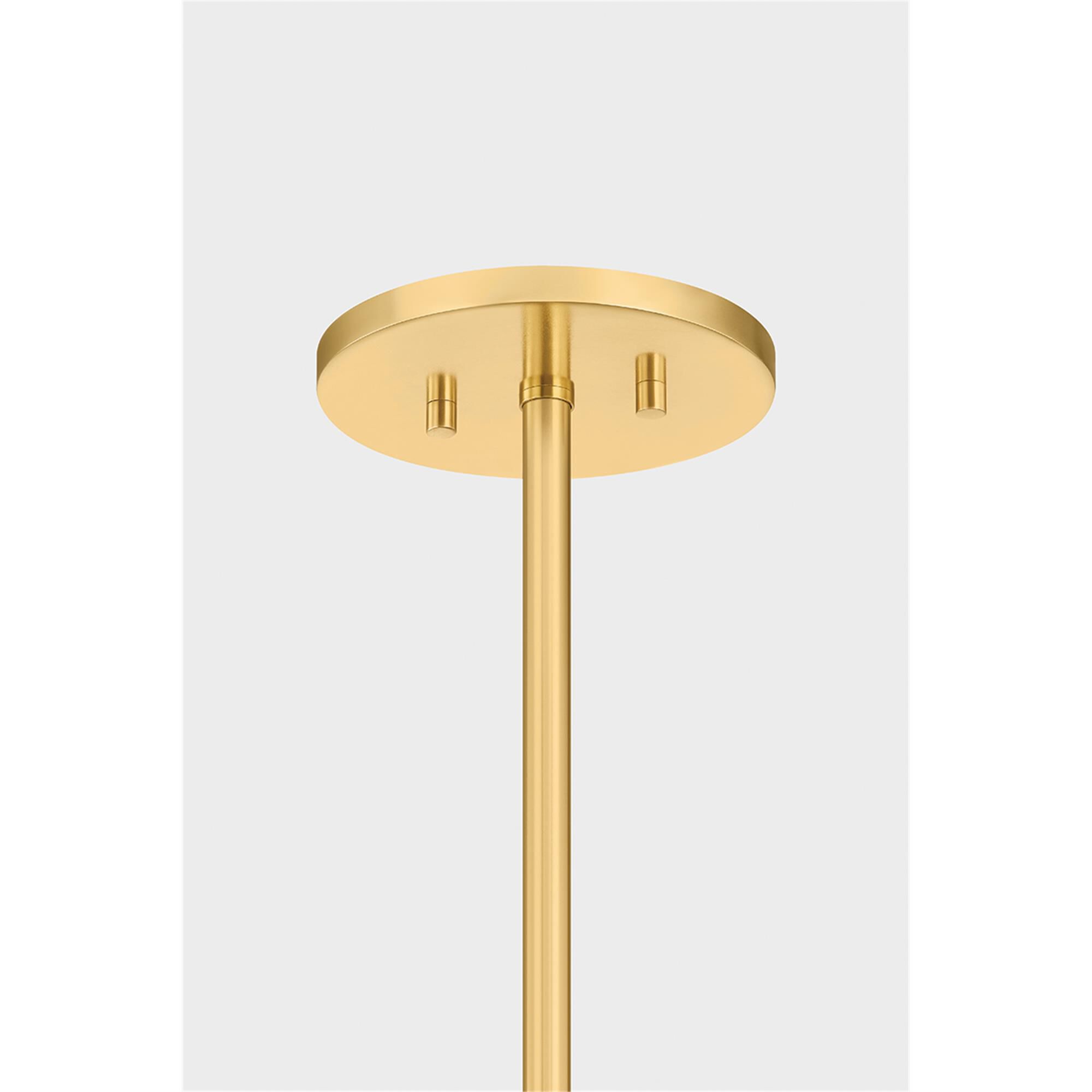 Shown in Aged Brass finish and Natural Woven Rattan shade