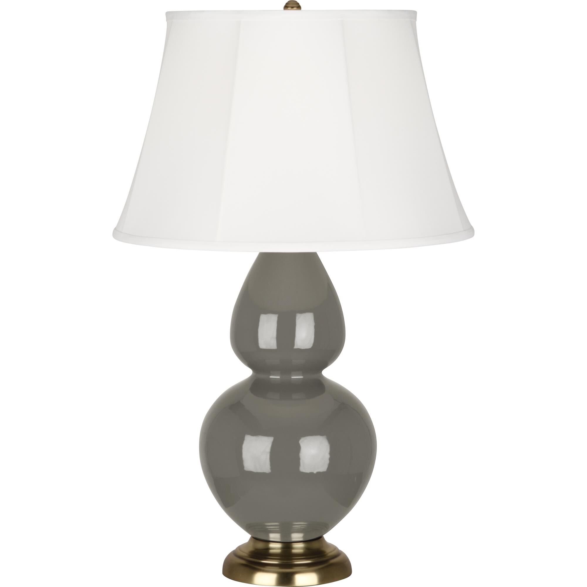 Shown in Ash Glazed Ceramic With Antique Brass ed Accents finish and Ivory Stretched Fabric shade