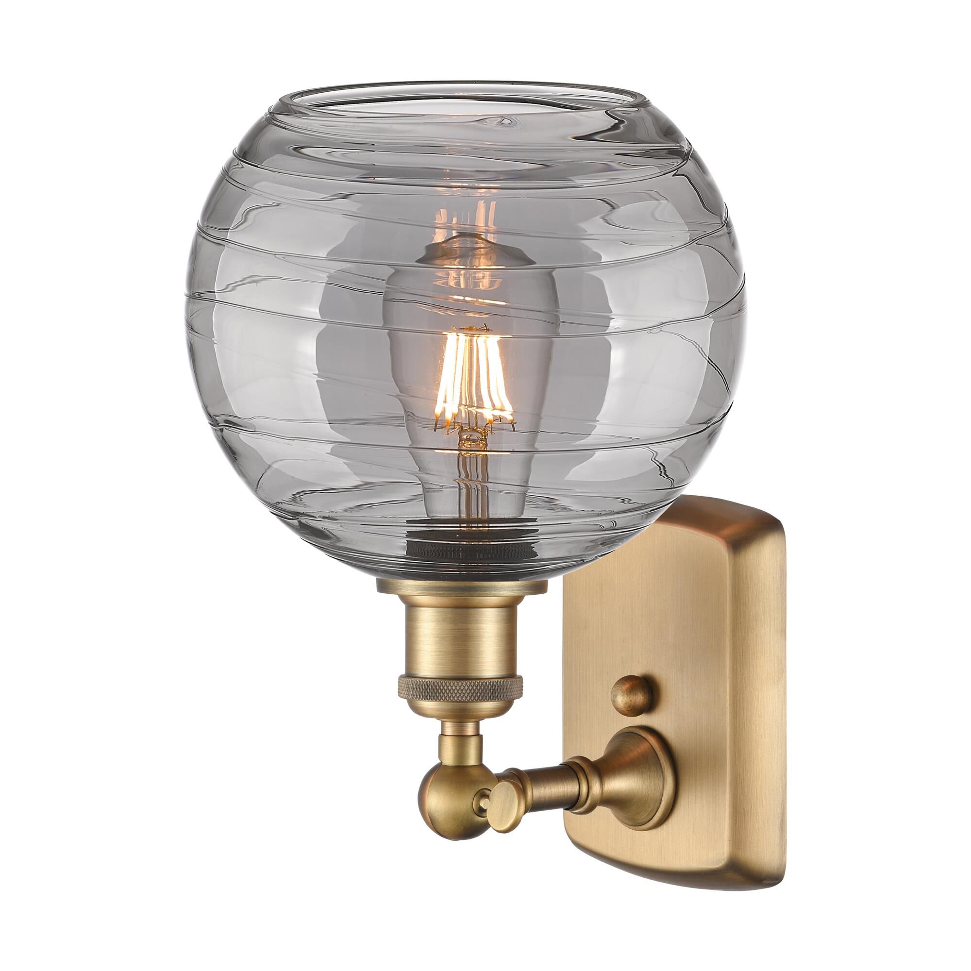 Shown in Brushed Brass finish and Light Smoke Deco Swirl glass