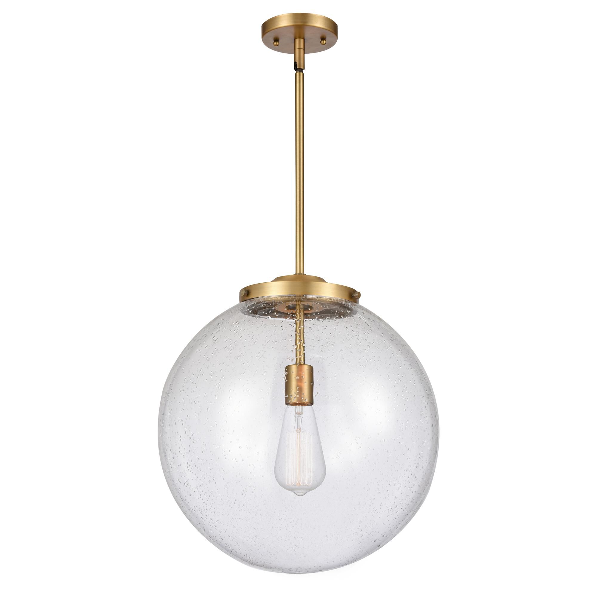 Shown in Brushed Brass finish and Seedy Beacon glass