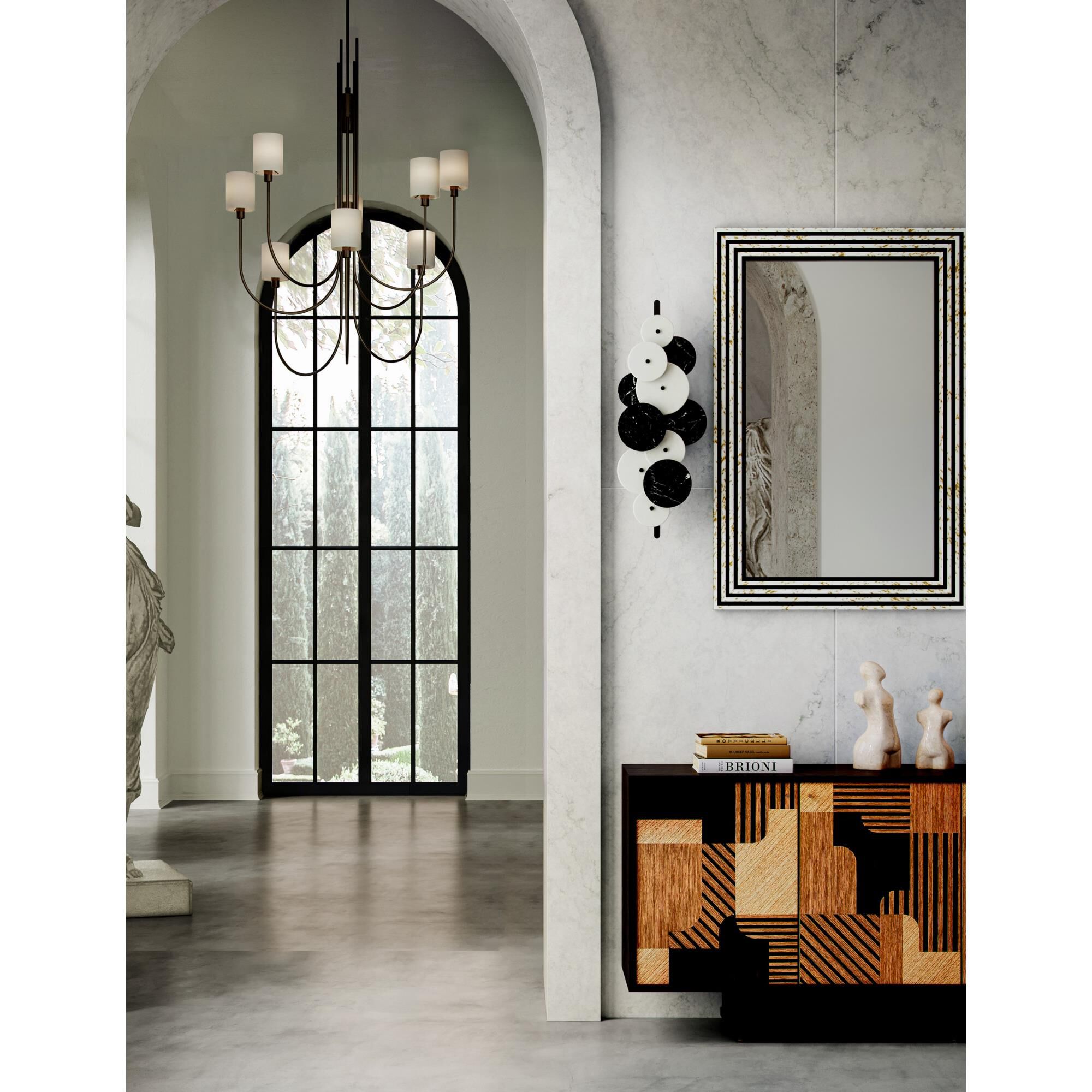 Shown in Statuary Bronze and Antique Brass finish and Off White Linen shade