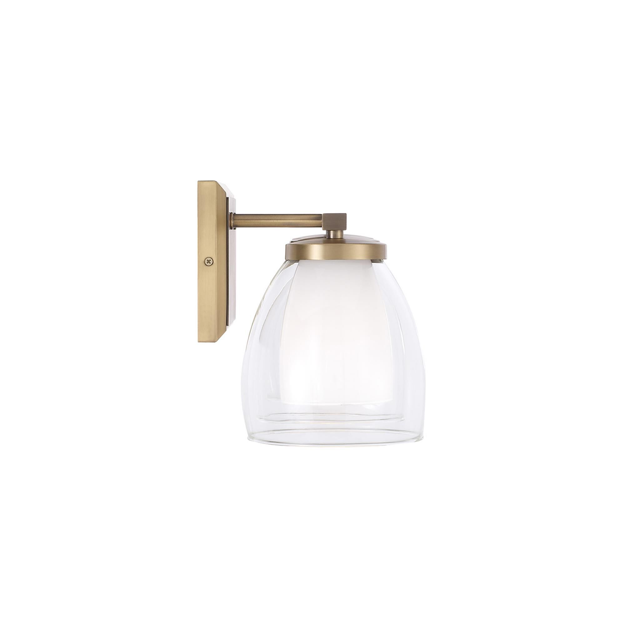 Shown in Aged Brass finish and Layered White And Clear glass