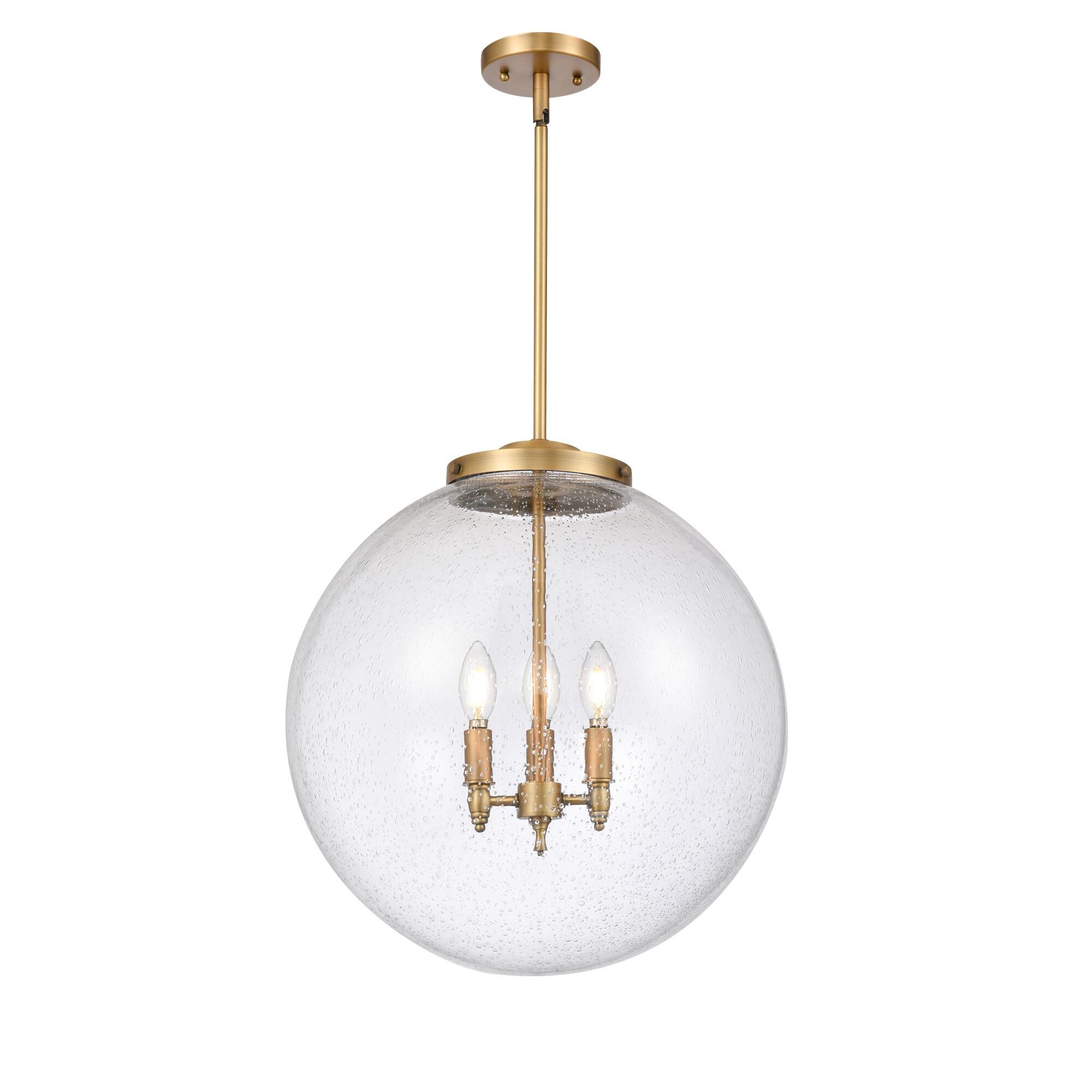Shown in Brushed Brass finish and Seedy Beacon glass