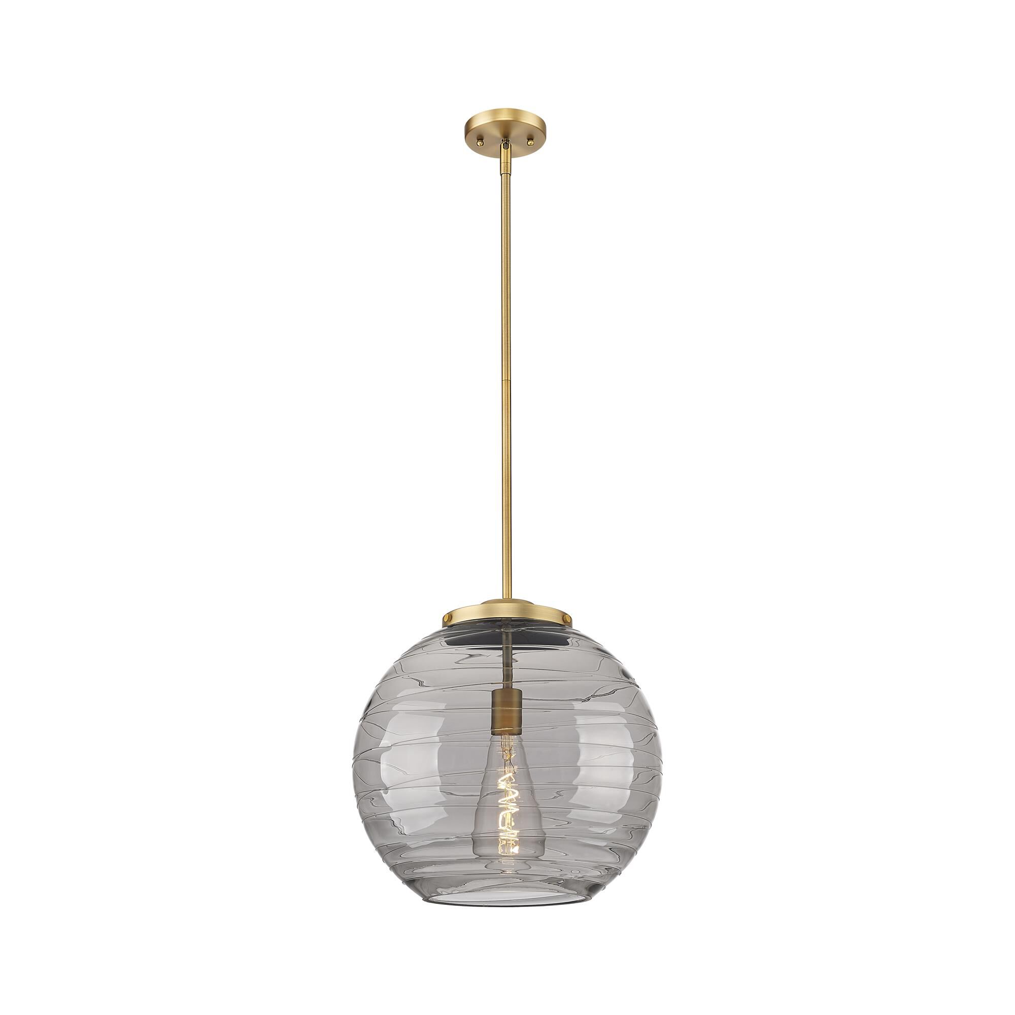 Shown in Brushed Brass finish and Light Smoke Deco Swirl glass