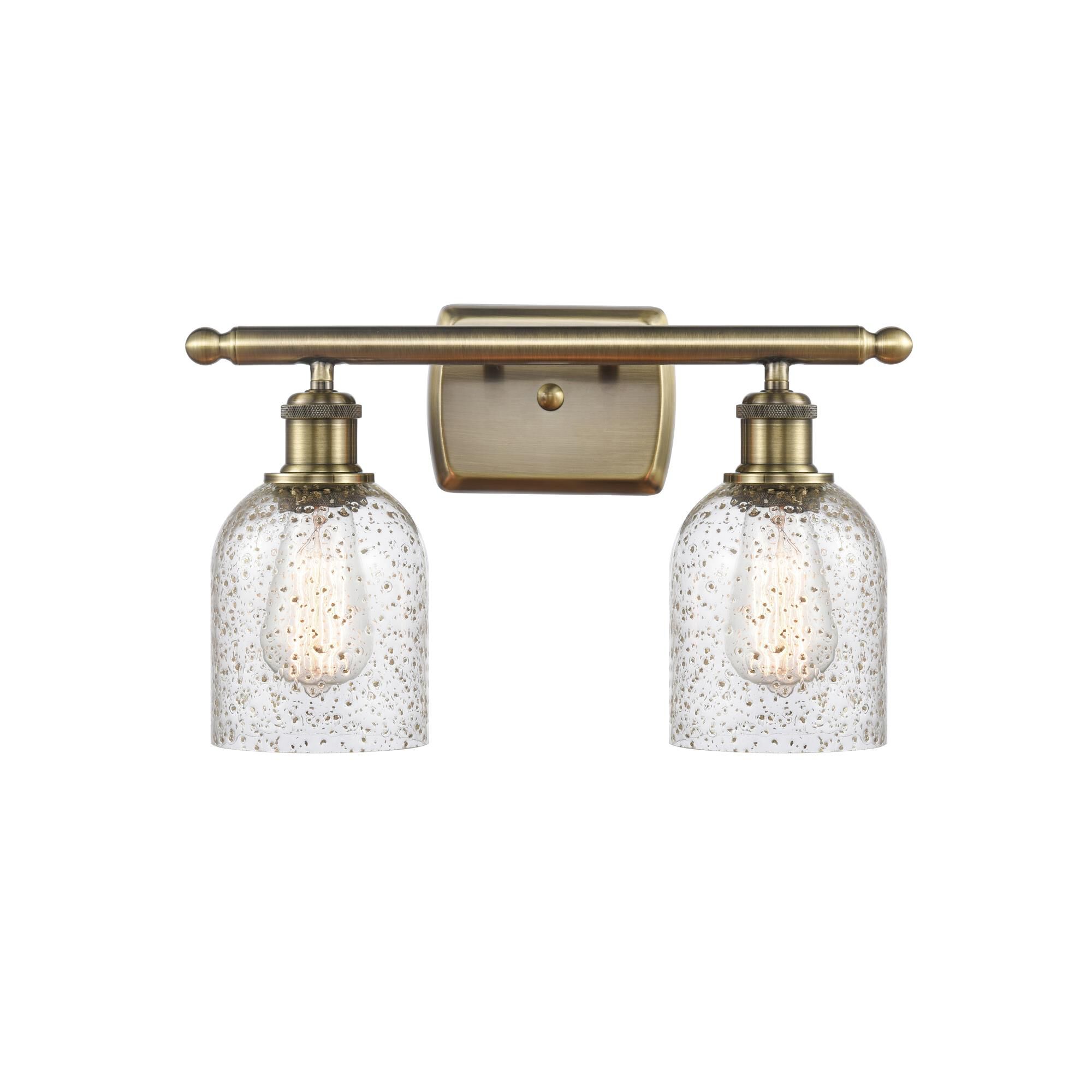 Shown in Antique Brass finish and Bell glass and Glass shade