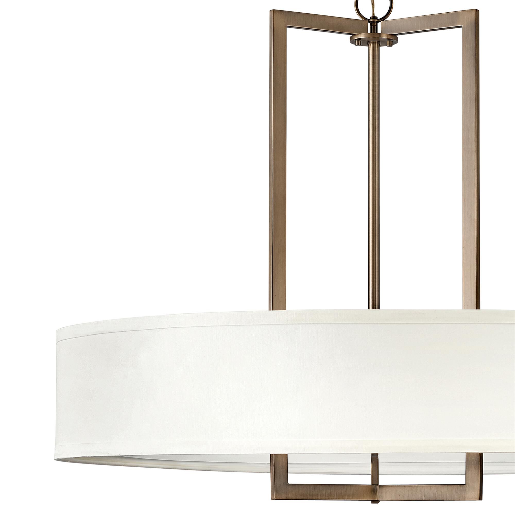 Shown in Brushed Bronze finish and Off-White Linen Hardback shade