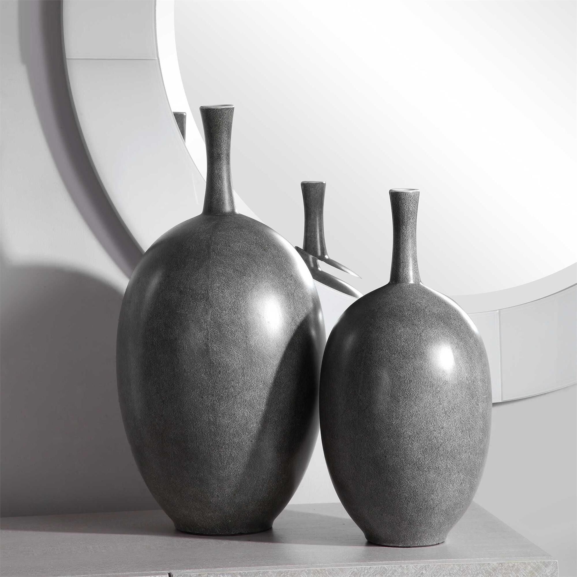 Shown in Made From Ceramic, These Contemporary Vases Feature A Marbled Black And White Exterior With A Matte  finish
