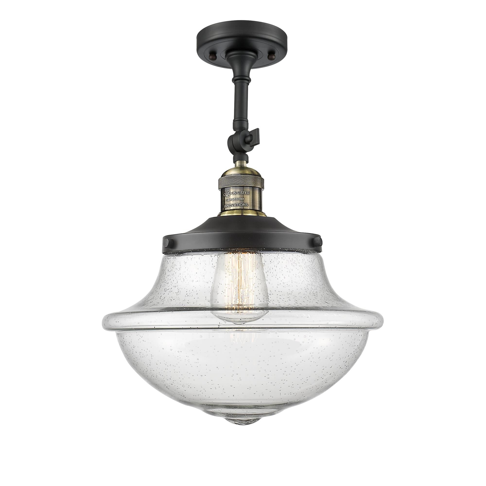 Shown in Black Antique Brass finish and Seedy glass