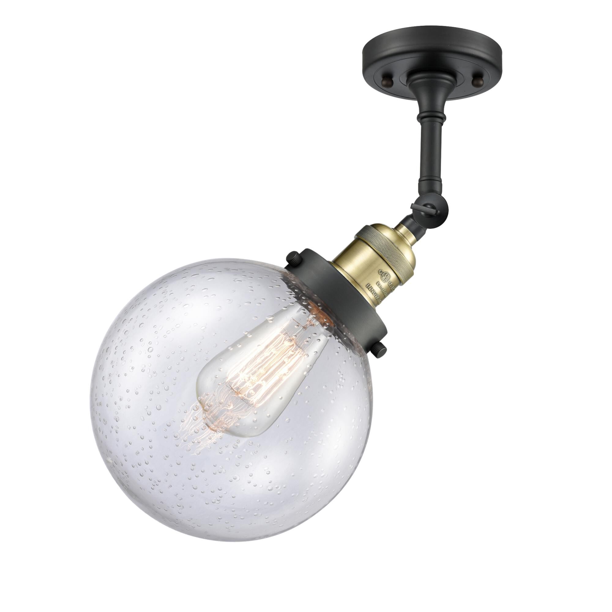 Shown in Black Antique Brass finish and Seedy glass and No Accent accent