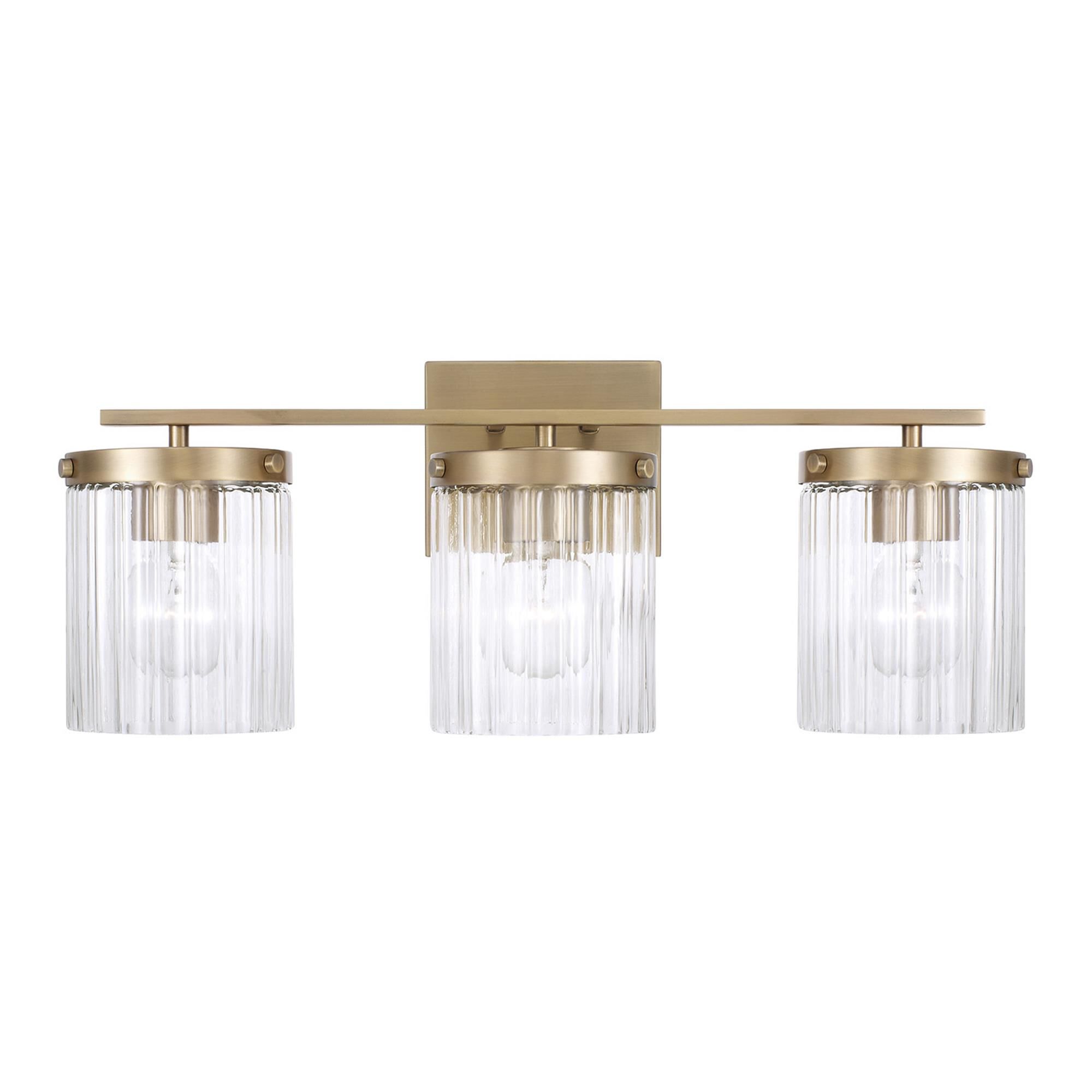 Shown in Aged Brass finish and Beveled Fluted glass