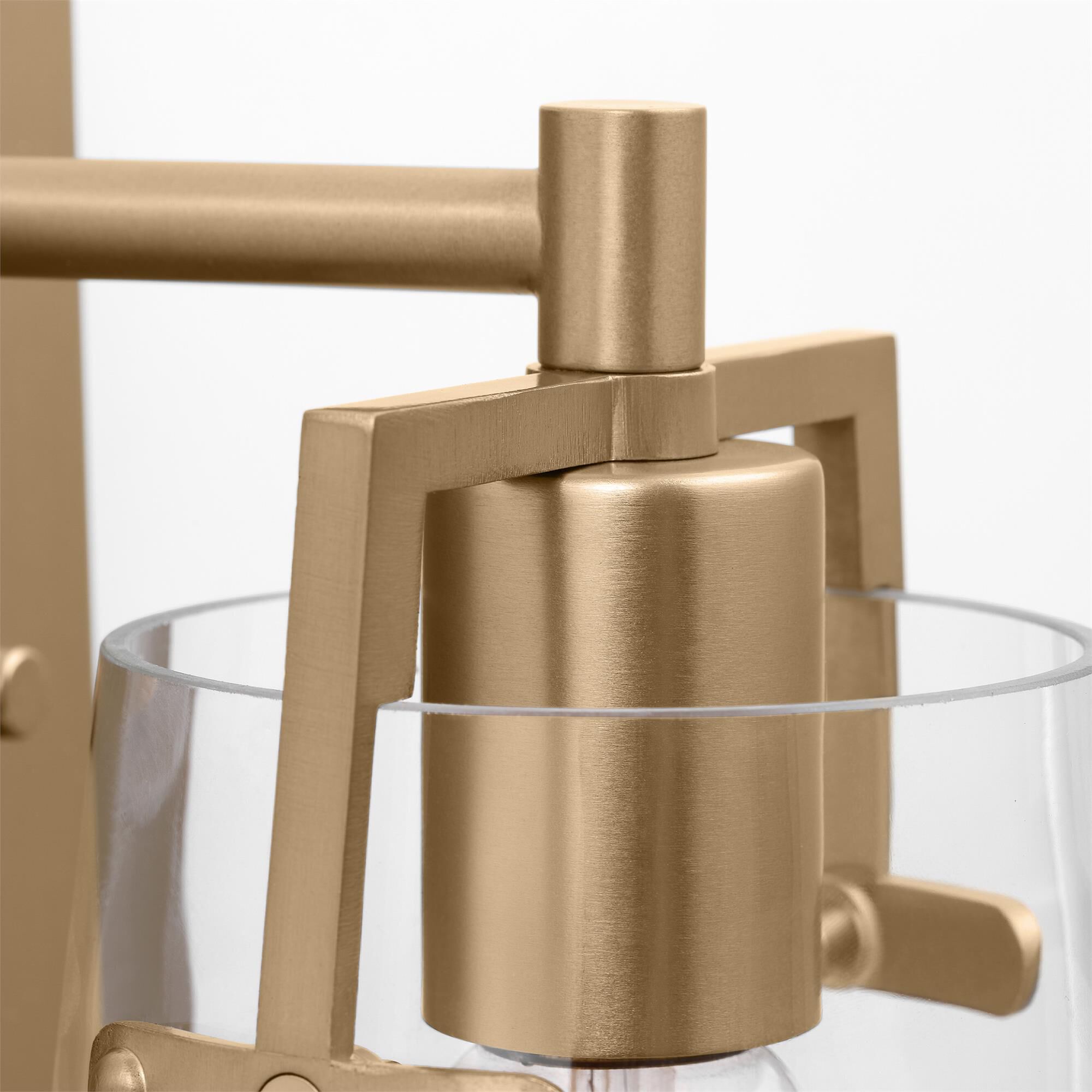 Shown in Satin Brass finish and Clear Glass shade