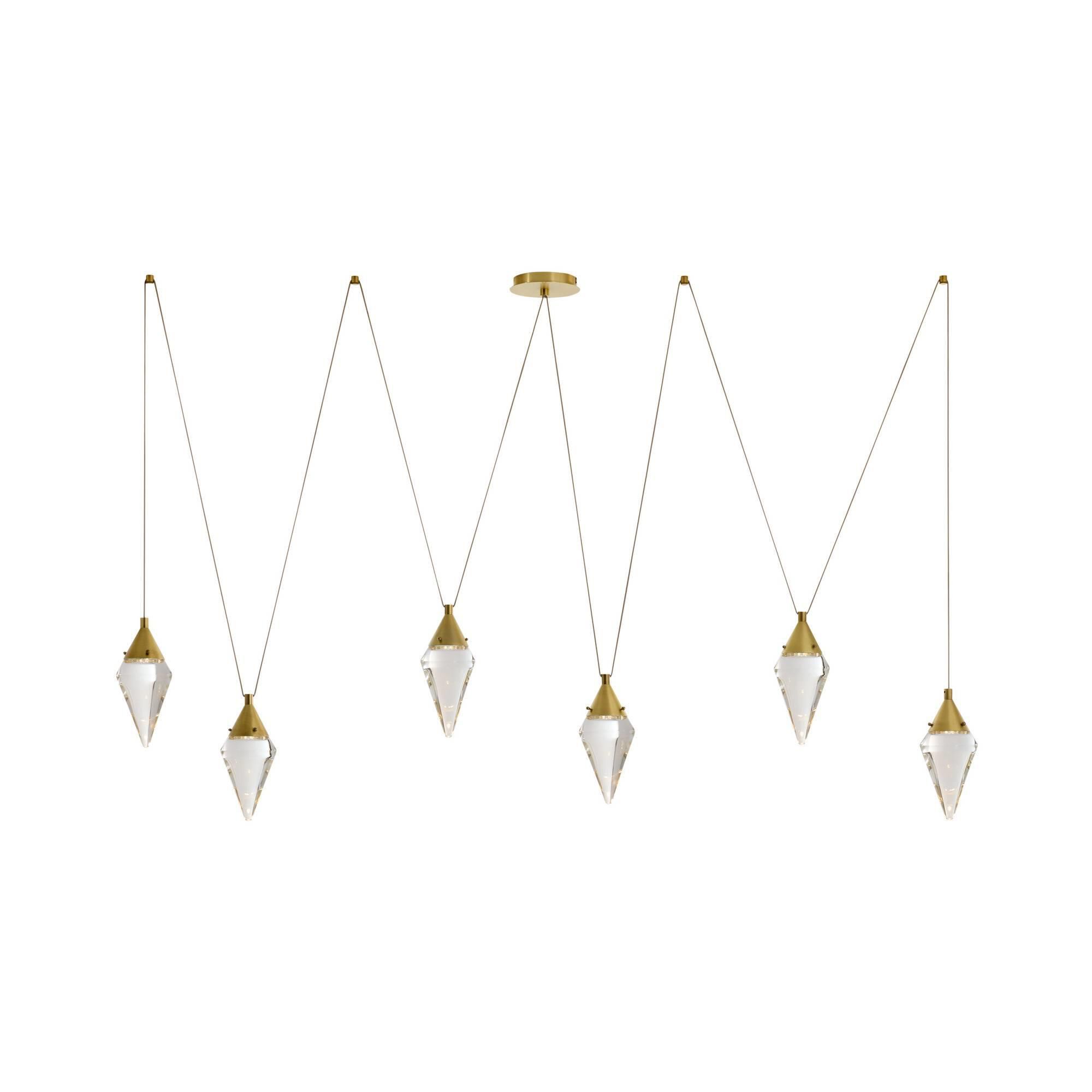 Shown in Antique Brass finish and Clear glass
